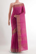 Pink Tussar Saree with Thread Butta on the body and Zari Border.  displayed on a mannequin