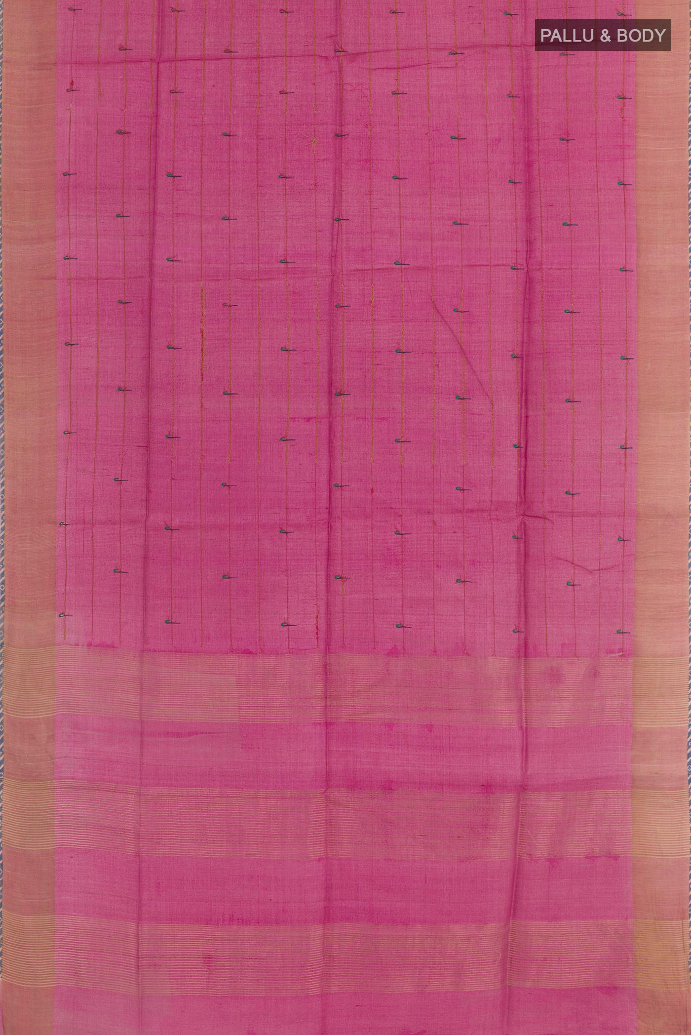 Flat view of Pink Tussar Saree with Thread Butta on the body and Zari Border. 