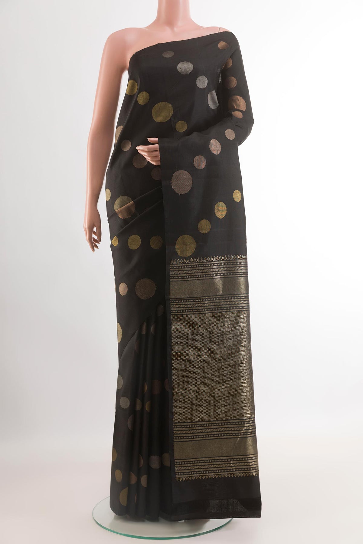 Black Kanjivaram Silk Saree with Zari Brocade on the body and Zari Border.  displayed on a mannequin