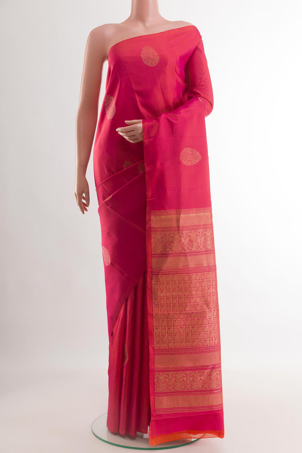 Pink Dual Tone Kanchipuram Silk Saree with Zari Butta on the body and Without Border.  displayed on a mannequin