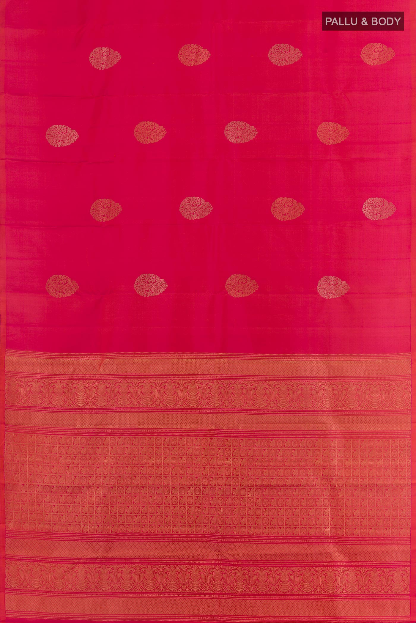 Flat view of Pink Dual Tone Kanchipuram Silk Saree with Zari Butta on the body and Without Border. 