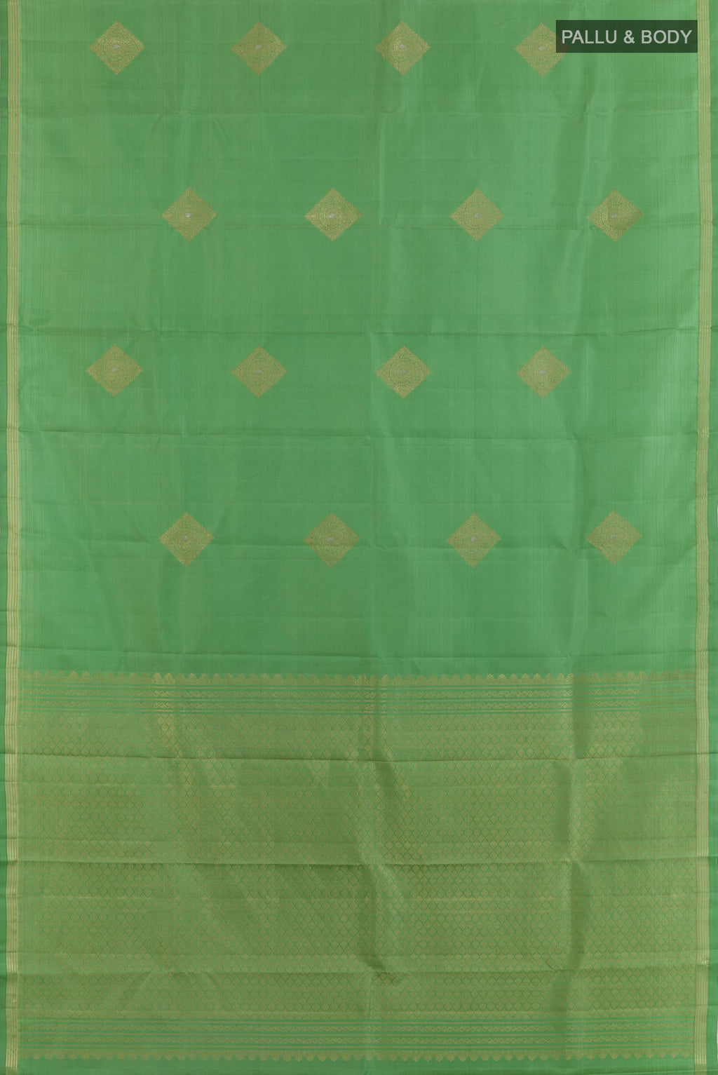 Flat view of Pista Green Kanchipuram Silk Saree with Zari Butta on the body and Zari Border. 