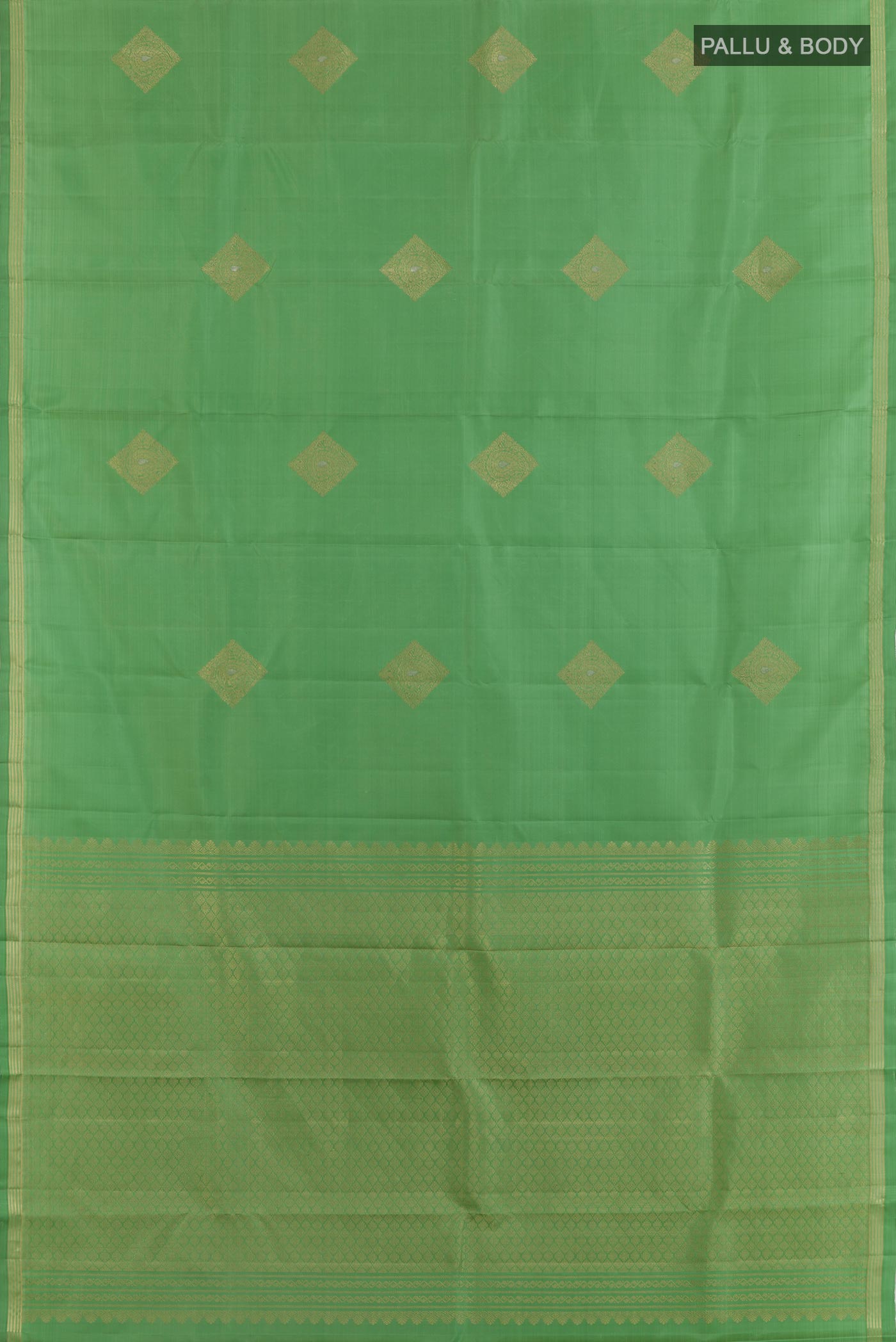 Flat view of Pista Green Kanchipuram Silk Saree with Zari Butta on the body and Zari Border. 