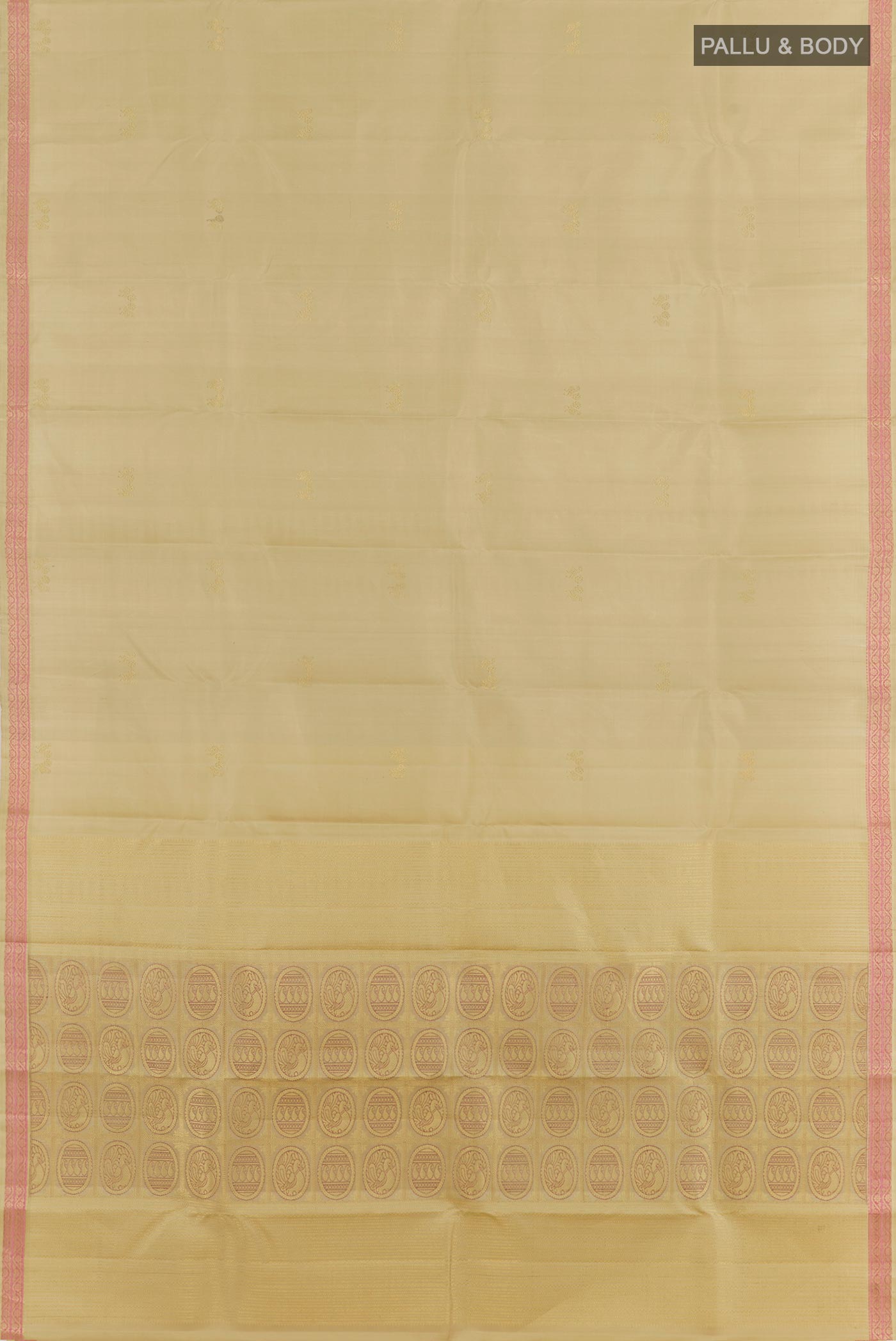 Flat view of Beige Kanchipuram Silk Saree with Zari Butta on the body and Zari Border. 