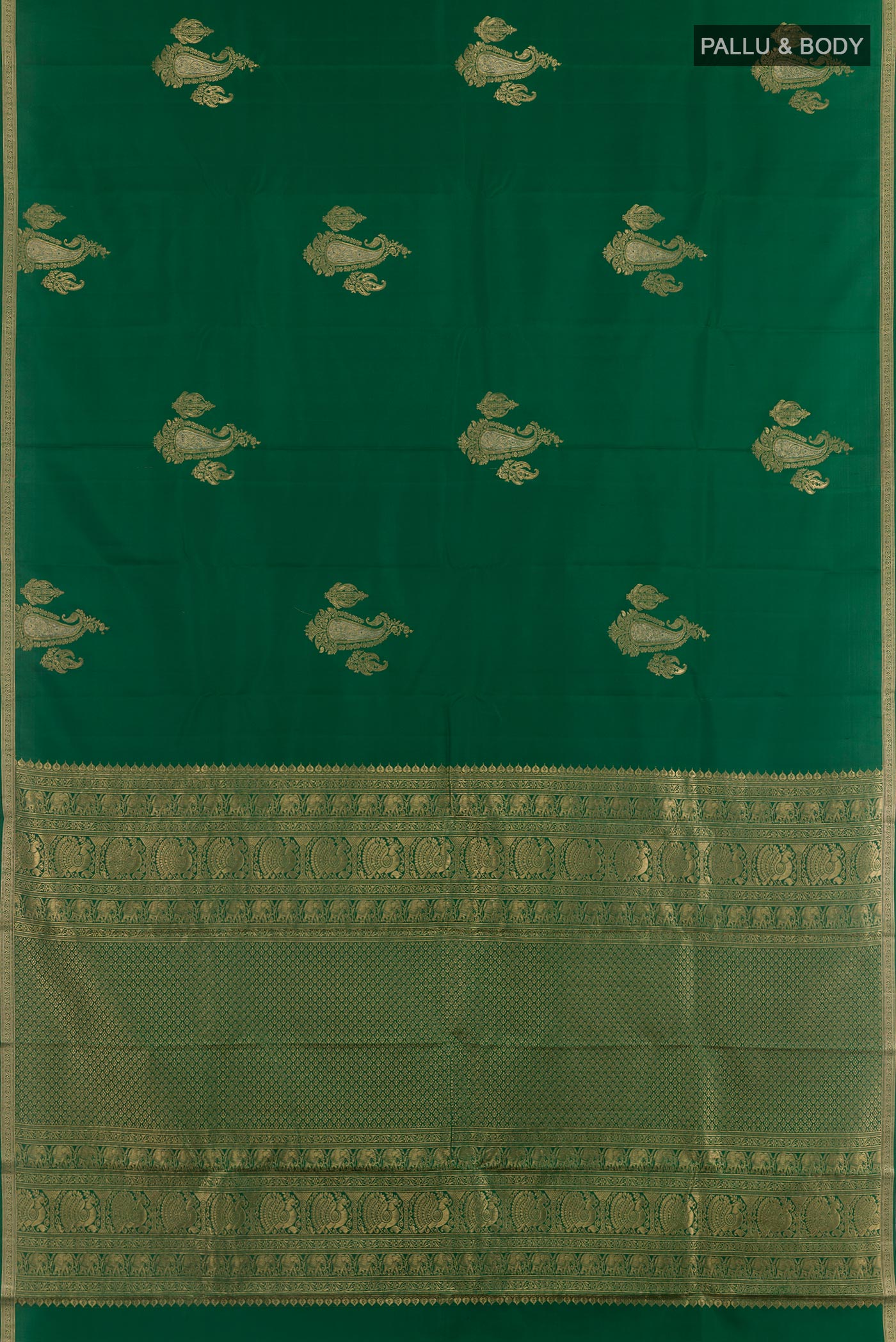 Flat view of Green Kanchipuram Silk Saree with Zari Butta on the body and Zari Border. 