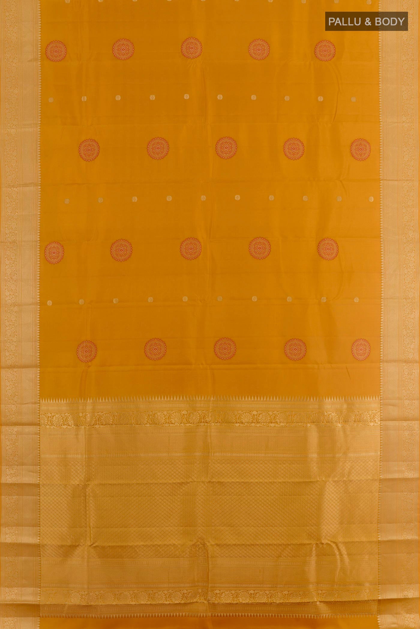 Flat view of Yellow Kanchipuram Silk Saree with Zari Butta on the body and Zari Border. 