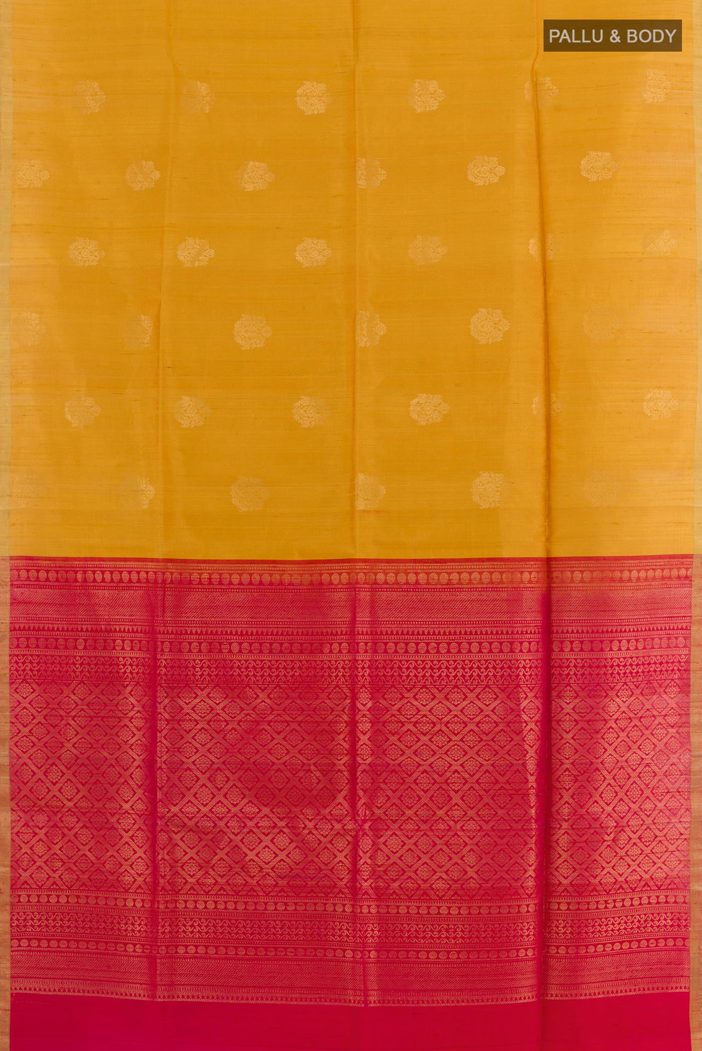 Flat view of Yellow Raw Silk Saree with Zari Butta on the body and Zari Border. 