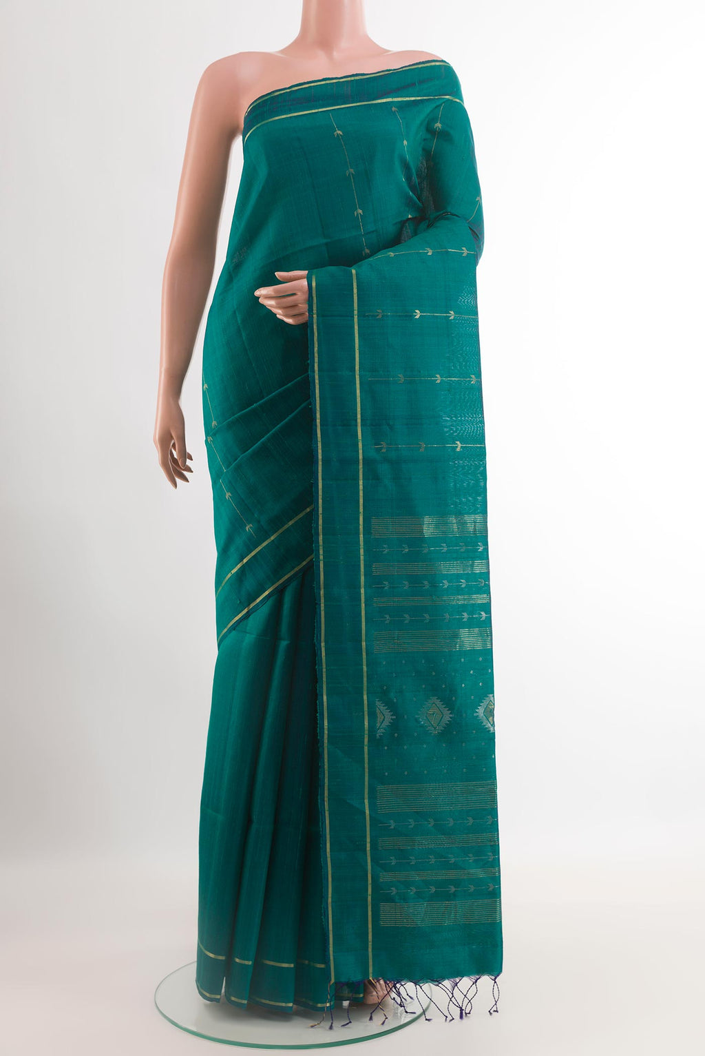 Teal Raw Silk Saree with Zari Butta on the body and Zari Border.  displayed on a mannequin