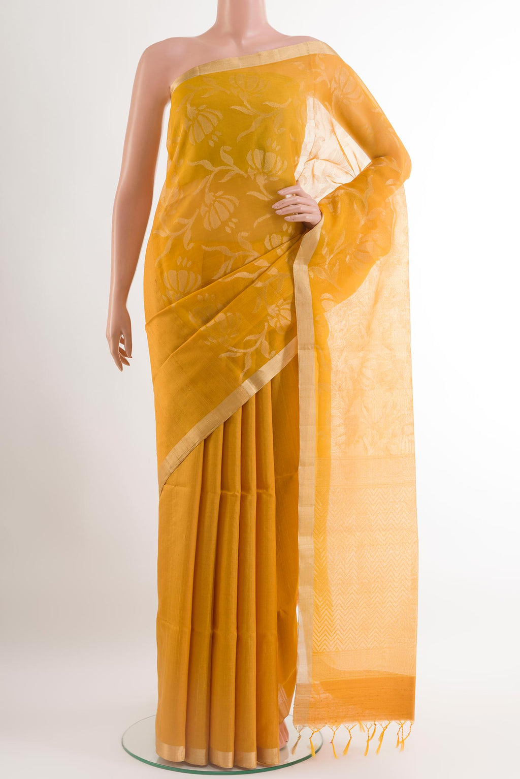 Yellow Raw Silk Saree with Plain Body and Zari Border.  displayed on a mannequin