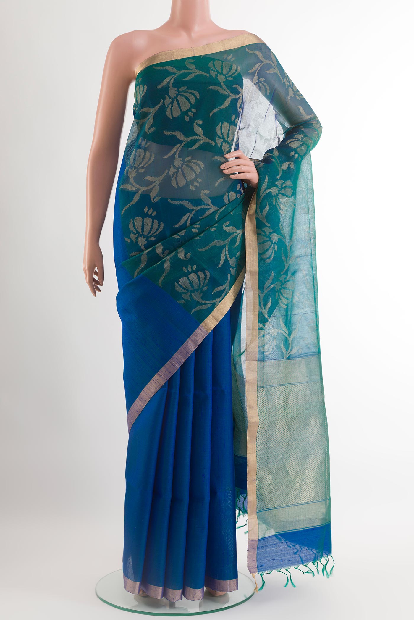 Blue Raw Silk Saree with Plain Body and Zari Border.  displayed on a mannequin
