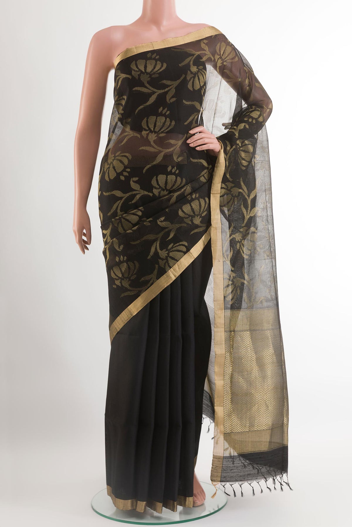 Black Raw Silk Saree with Plain Body and Zari Border.  displayed on a mannequin
