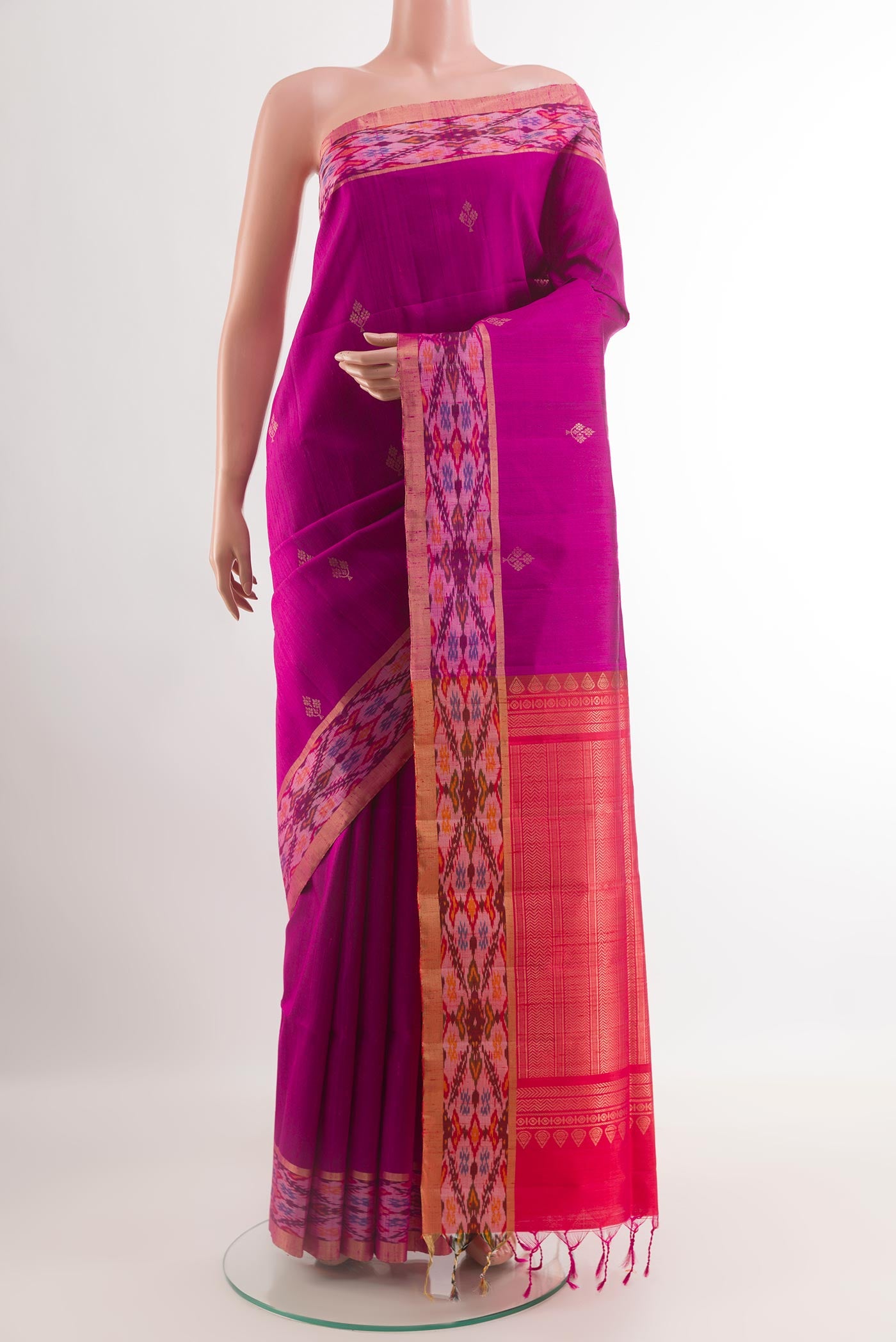 Purple Raw Silk Saree with Zari Butta on the body and Zari Border.  displayed on a mannequin