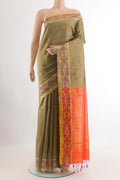 Beige Raw Silk Saree with Zari Butta on the body and Zari Border.  displayed on a mannequin