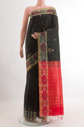 Black Raw Silk Saree with Zari Butta on the body and Zari Border.  displayed on a mannequin