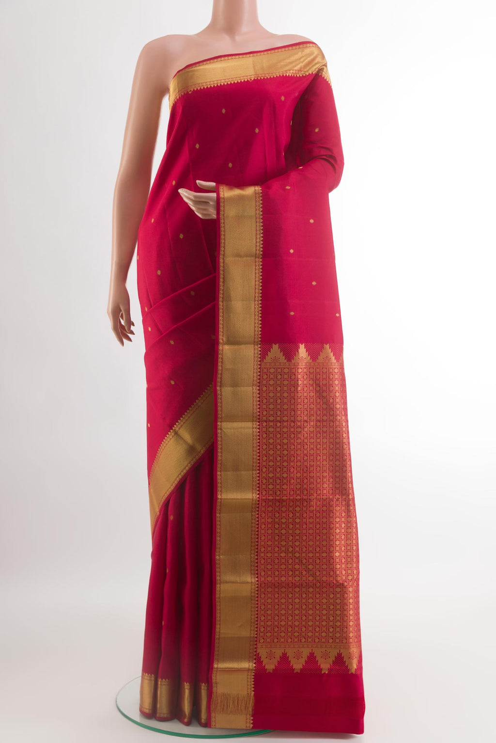 Maroon Kanjivaram Silk Saree with Zari Butta on the body and Zari Border.  displayed on a mannequin