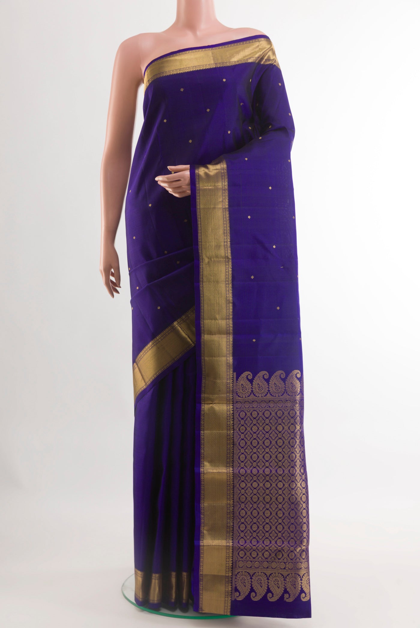 Blue Kanjivaram Silk Saree with Zari Butta on the body and Zari Border.  displayed on a mannequin