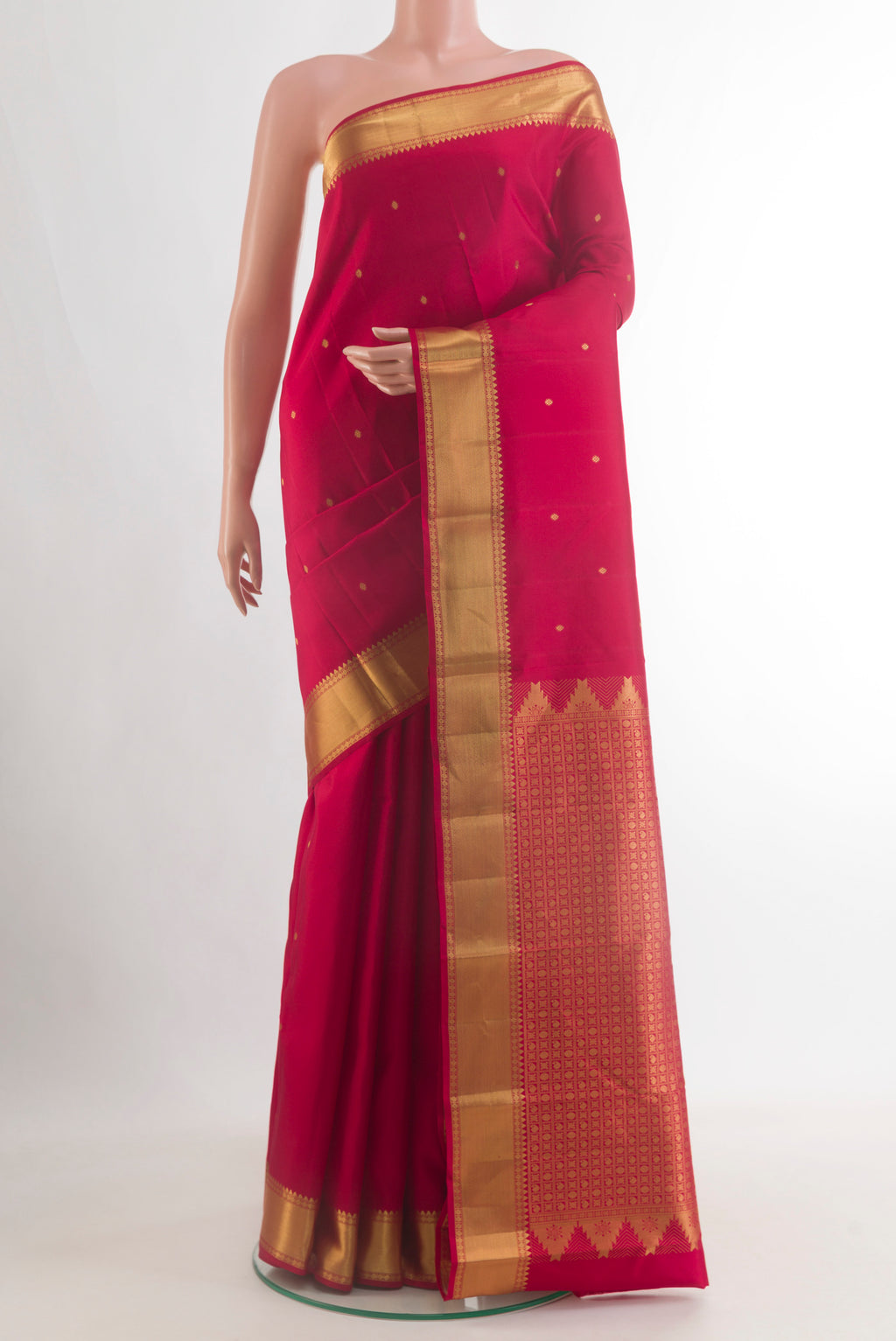 Pure Silk Red Kanjivaram Saree with Zari Brocade on the body and Zari Border.  displayed on a mannequin