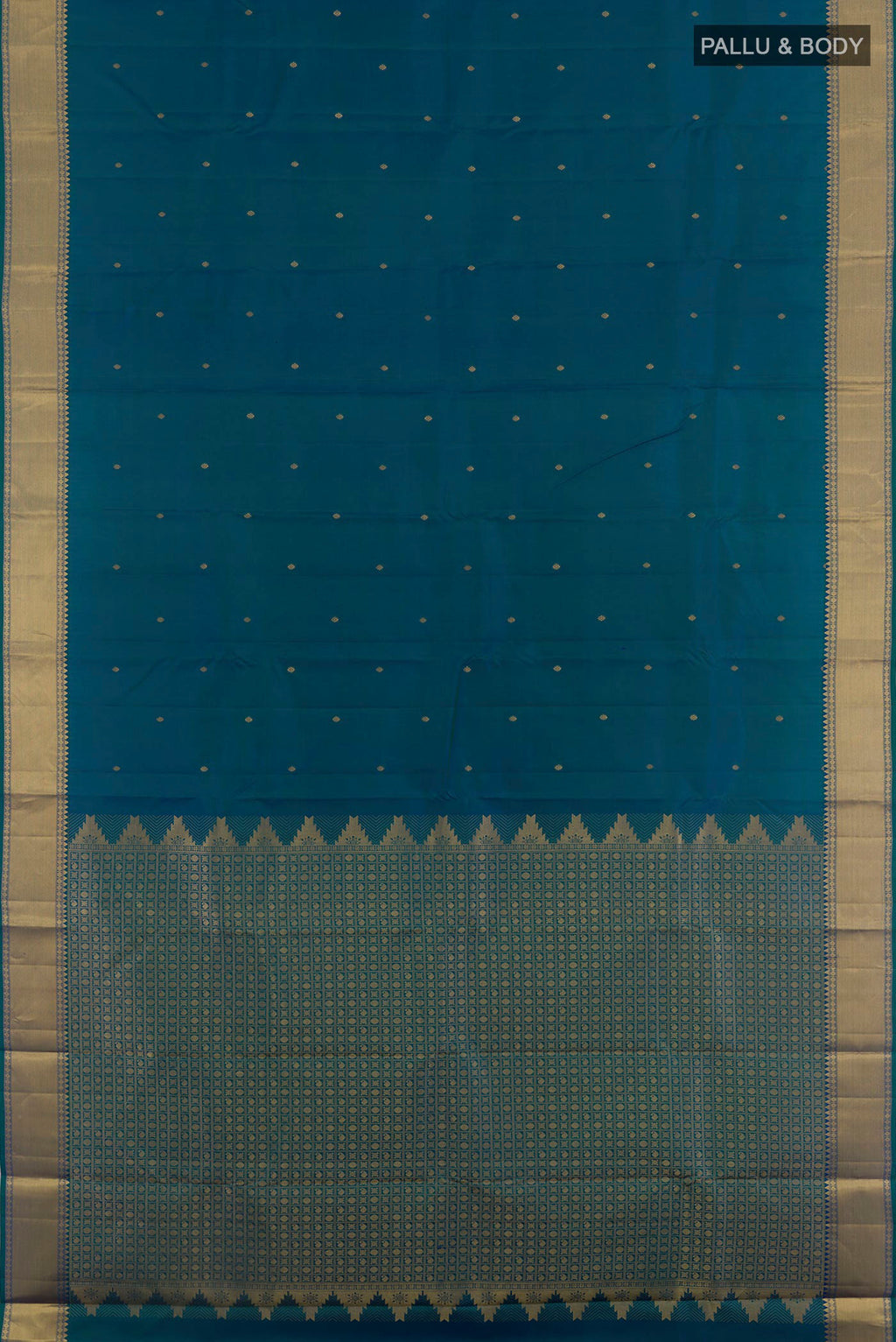 Flat view of Peacock Blue Kanjivaram Silk Saree with Zari Butta on the body and Zari Border. 