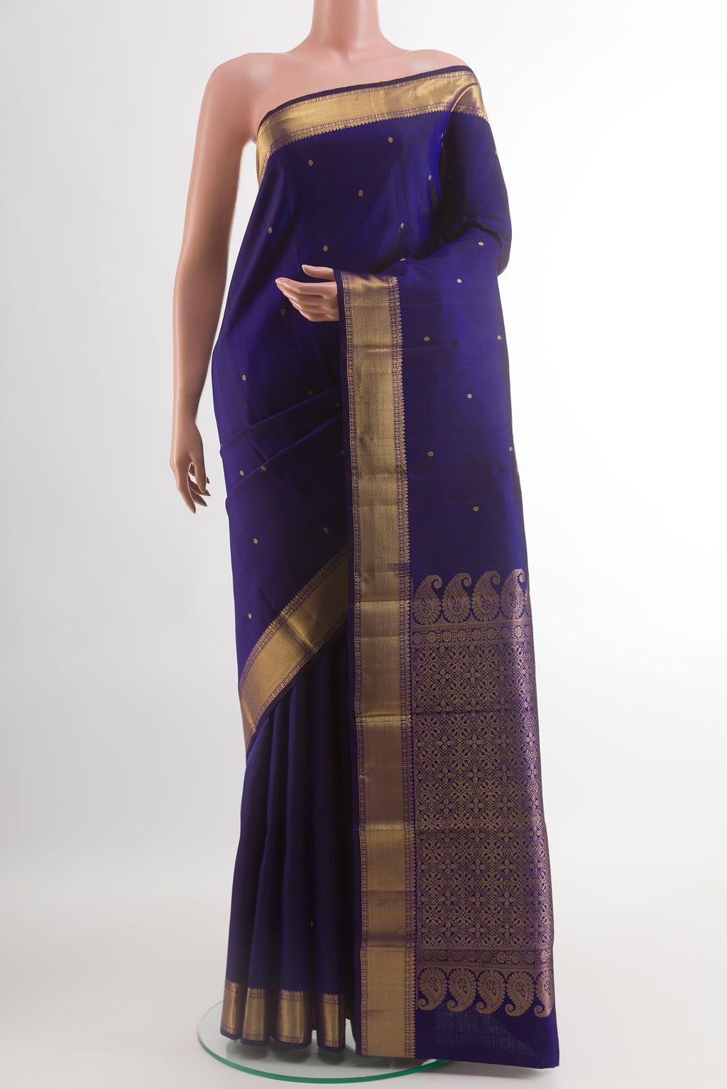 Dark Blue Kanjivaram Silk Saree with Zari Butta on the body and Zari Border.  displayed on a mannequin