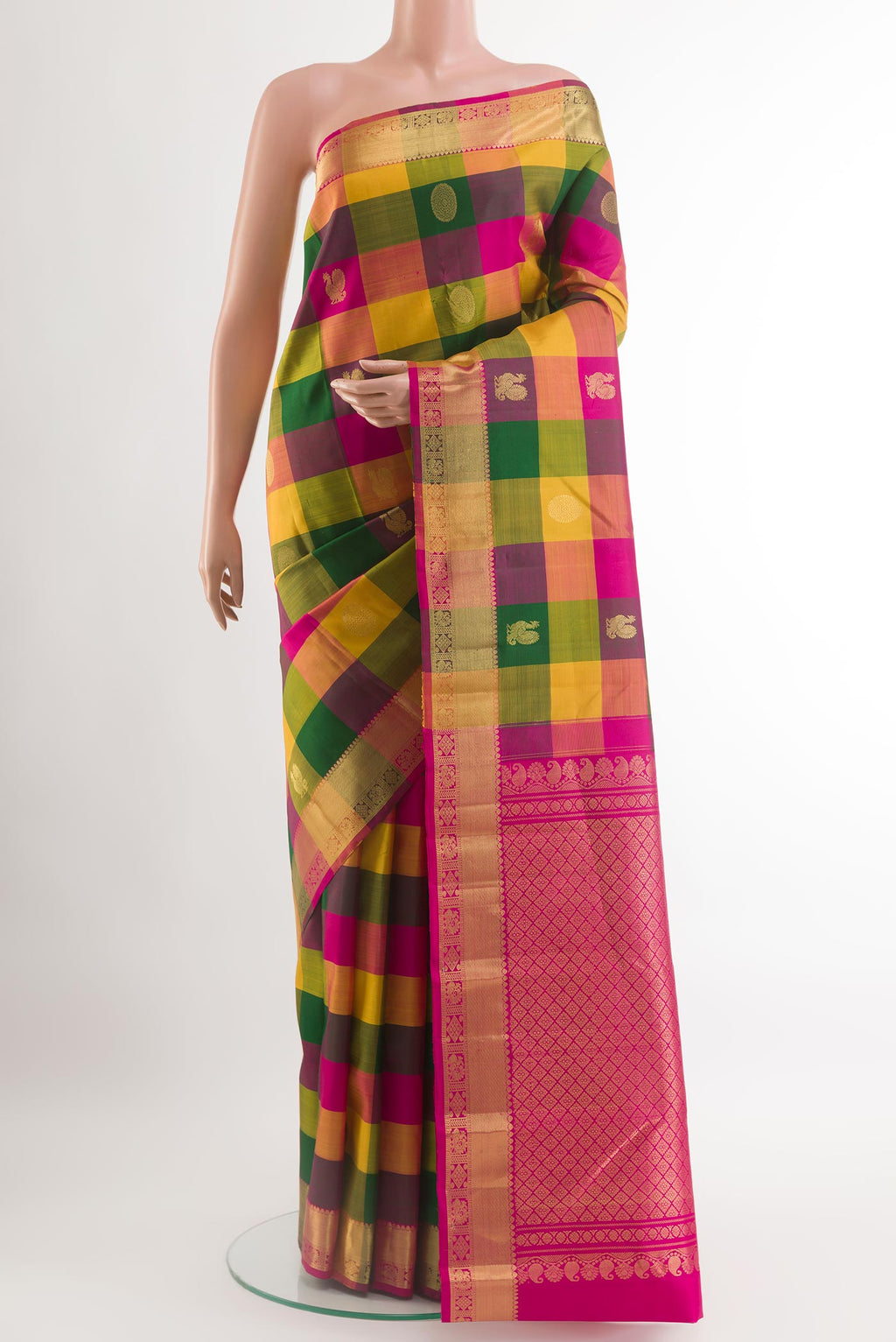 Multi Color Kanchipuram Silk Saree with Checked design on the body and Zari Border.  displayed on a mannequin