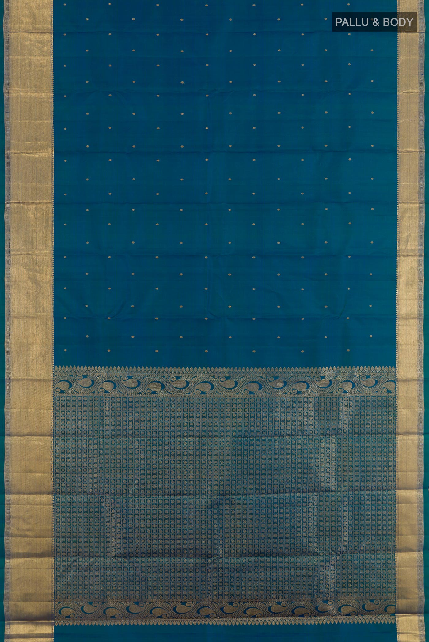 Flat view of Peacock Blue Kanchipuram Silk Saree with Zari Butta on the body and Zari Border. 