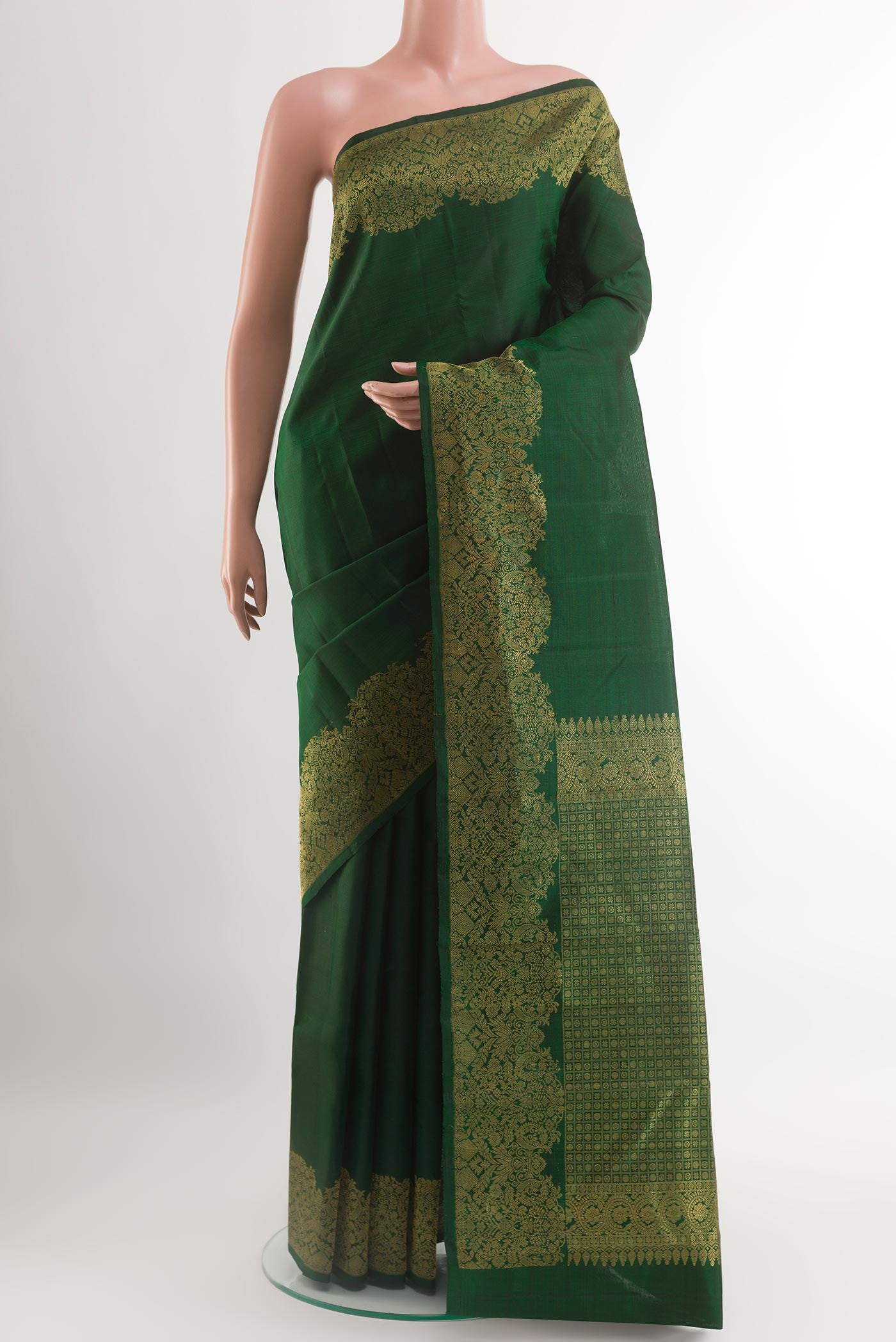 Green Kanchipuram Silk Saree with Plain Body and Zari Border.  displayed on a mannequin
