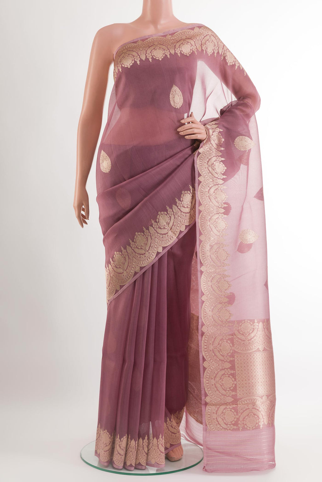 Lavender Organza Silk Saree with Zari Butta on the body and Zari Border.  displayed on a mannequin