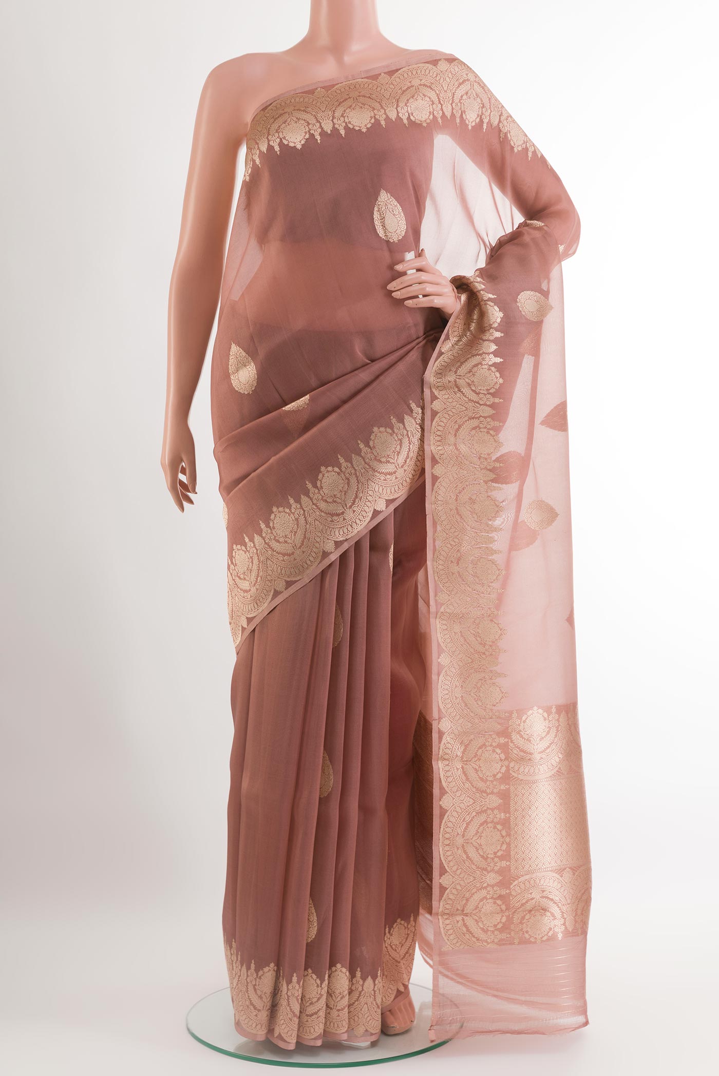 Lavender Organza Silk Saree with Zari Butta on the body and Zari Border.  displayed on a mannequin