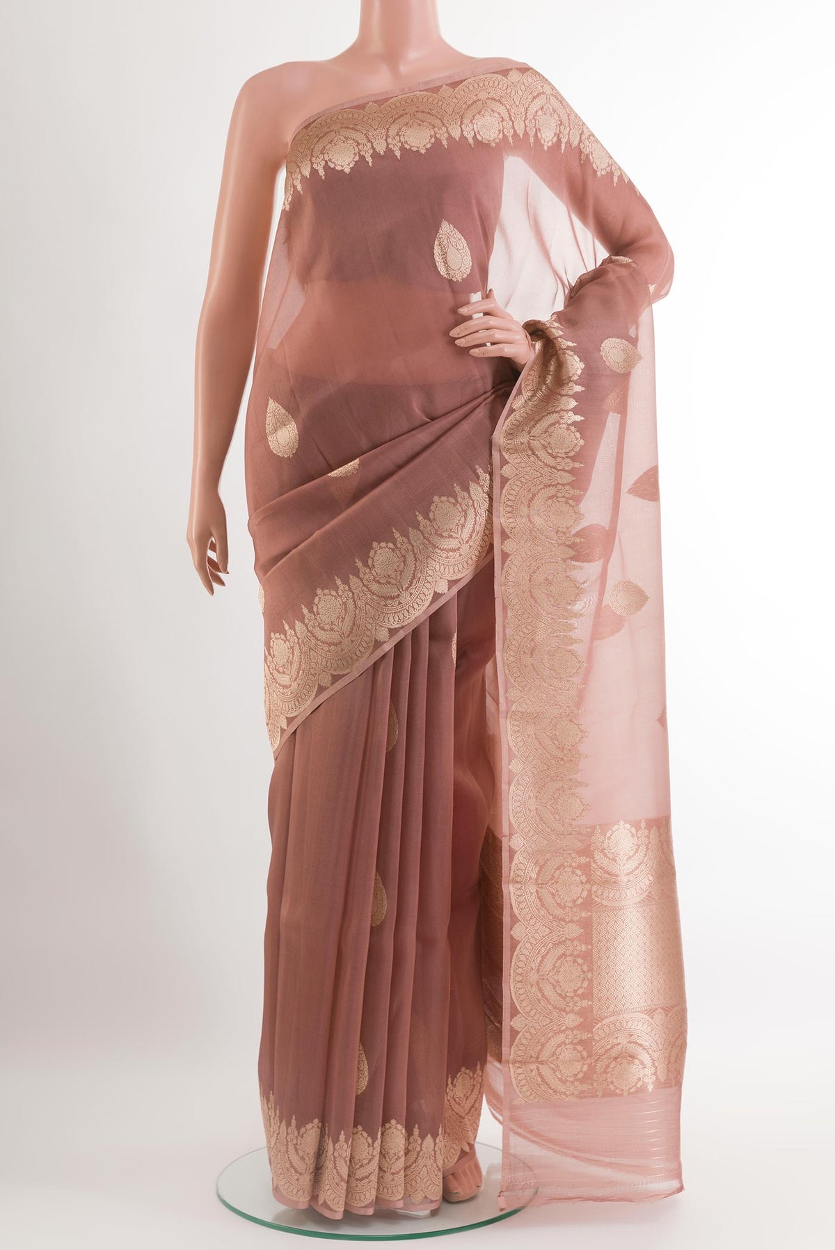 Lavender Organza Silk Saree with Zari Butta on the body and Zari Border.  displayed on a mannequin
