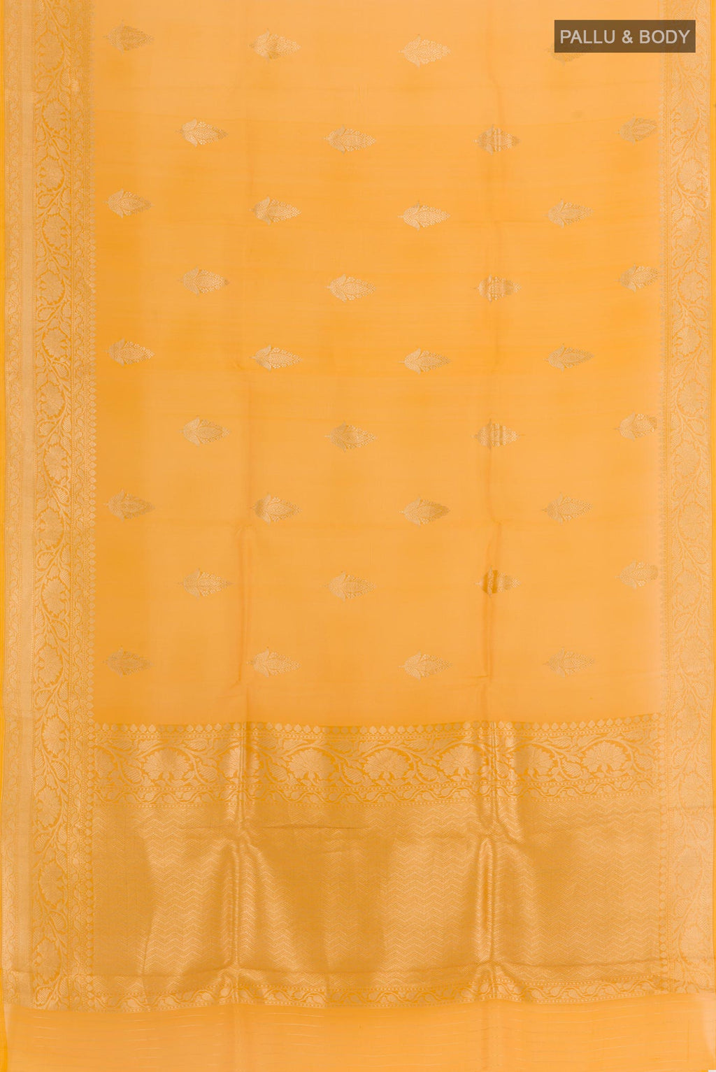 Flat view of Yellow Organza Silk Saree with Zari Butta on the body and Zari Border. 