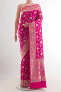 Pure Silk Pink Banarasi Saree with Zari Brocade on the body and Zari Border.  displayed on a mannequin