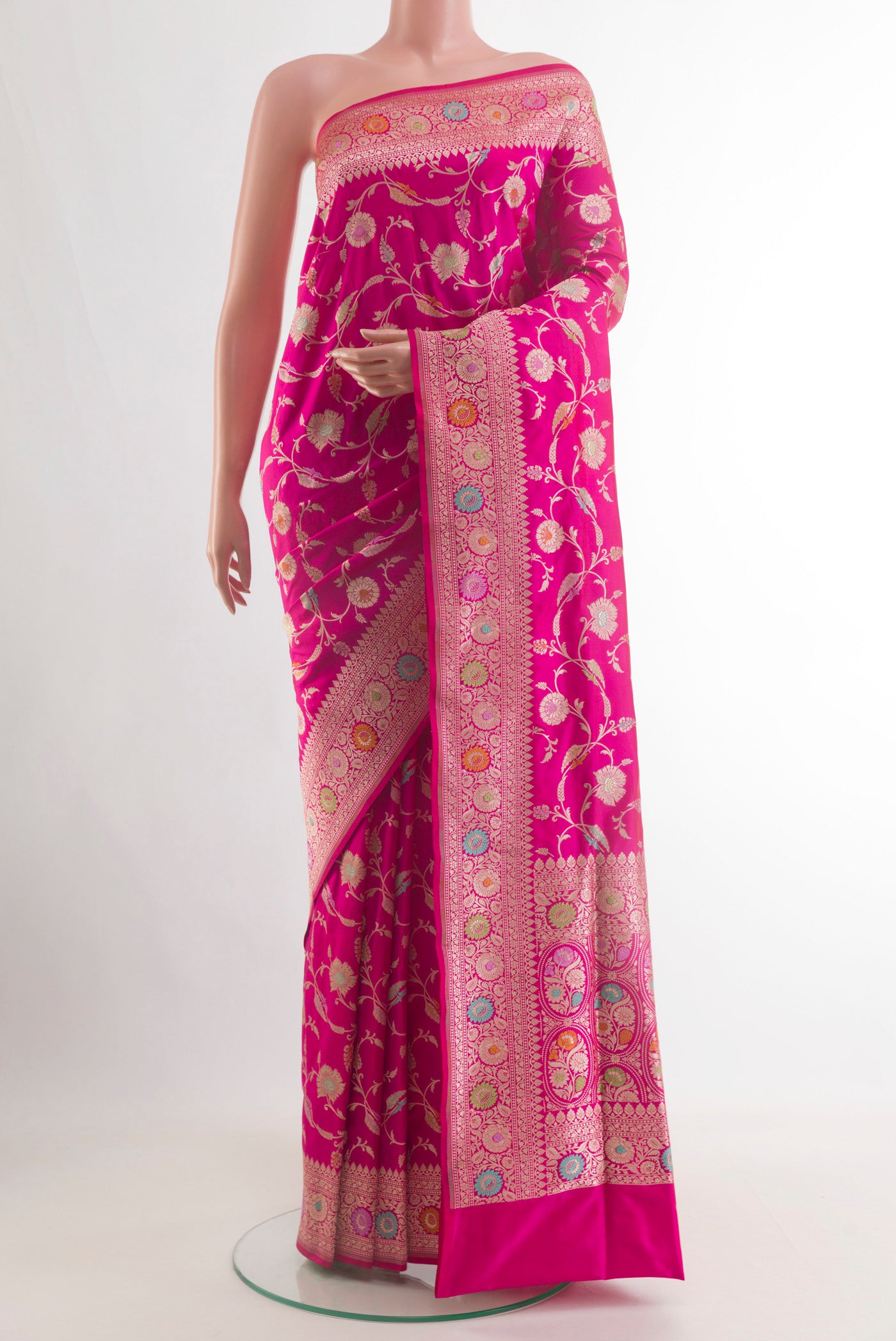 Pure Silk Pink Banarasi Saree with Zari Brocade on the body and Zari Border.  displayed on a mannequin