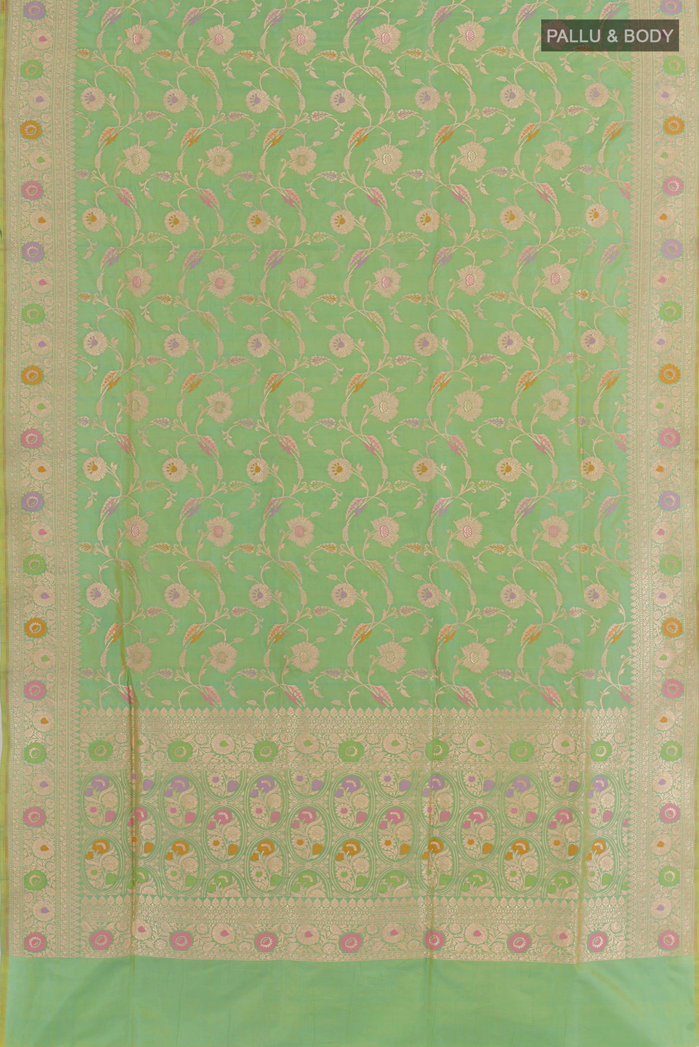 Flat view of Green Banarasi Silk Saree with Zari Brocade on the body and Zari Border. 