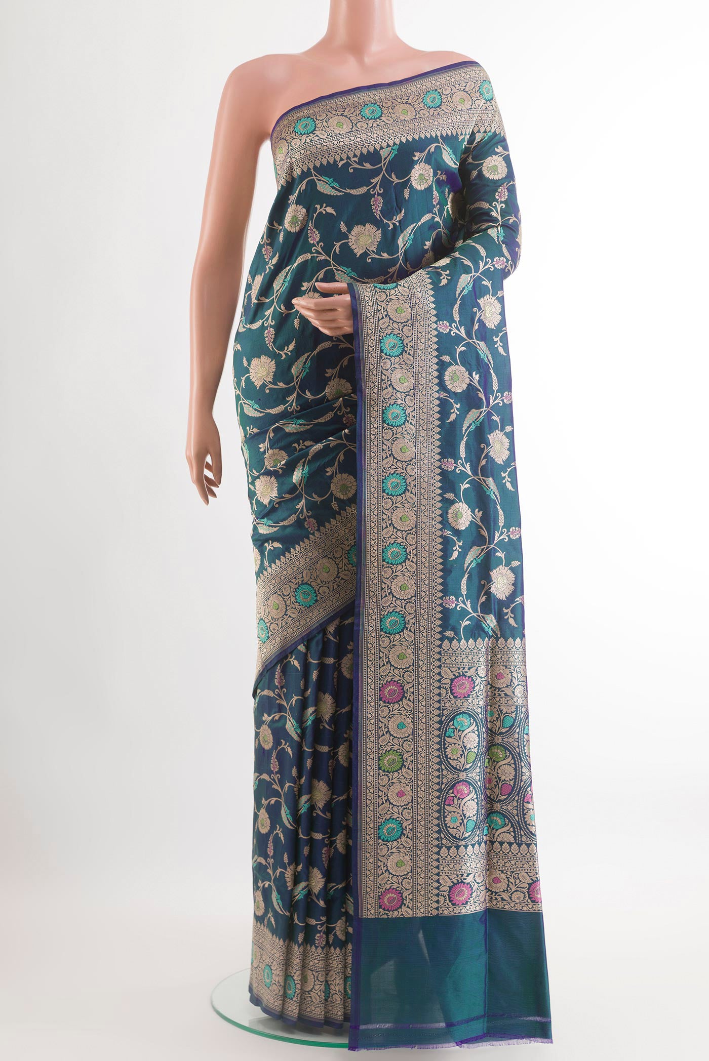 Peacock Blue Banarasi Silk Saree with Zari Brocade on the body and Zari Border.  displayed on a mannequin