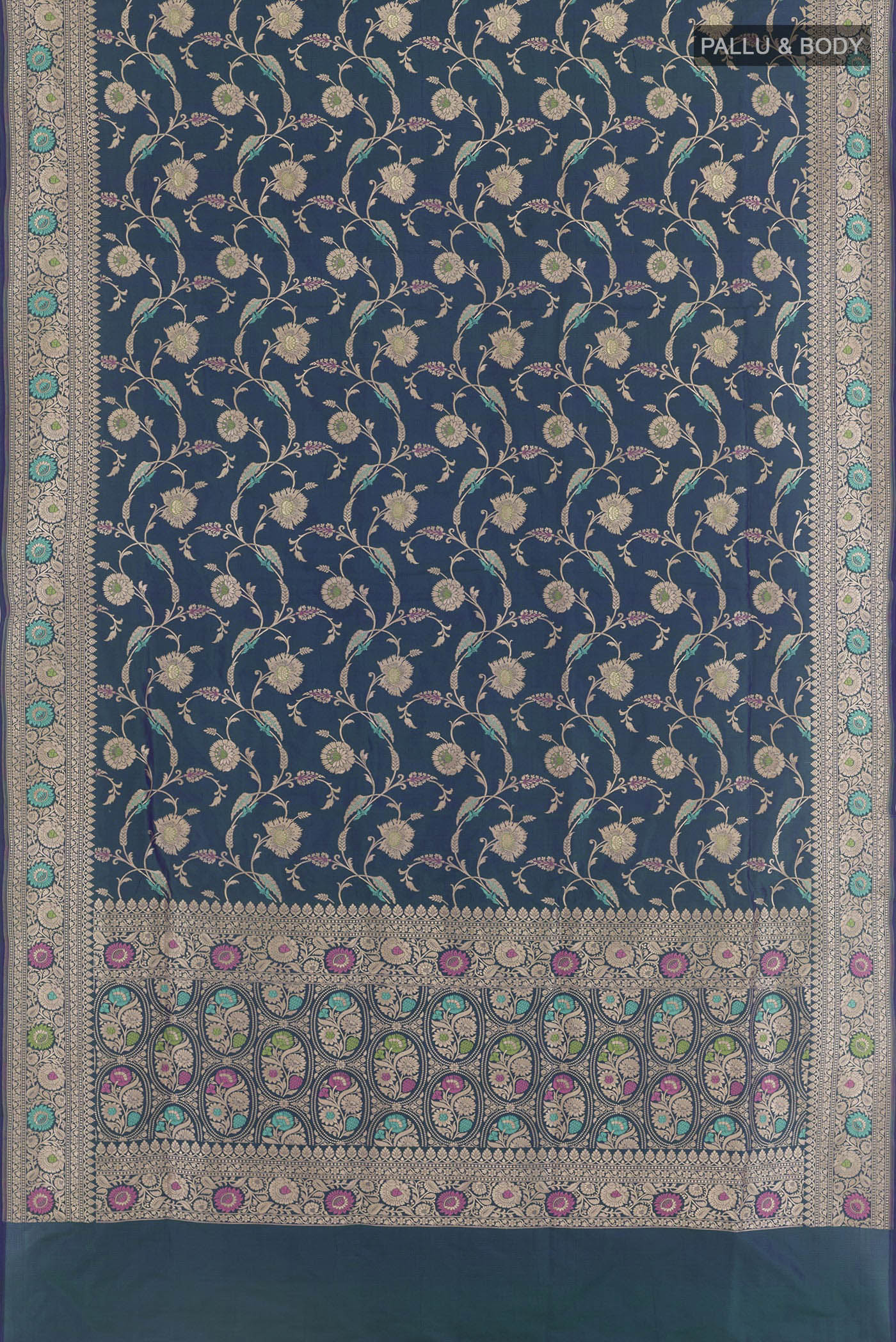 Flat view of Peacock Blue Banarasi Silk Saree with Zari Brocade on the body and Zari Border. 