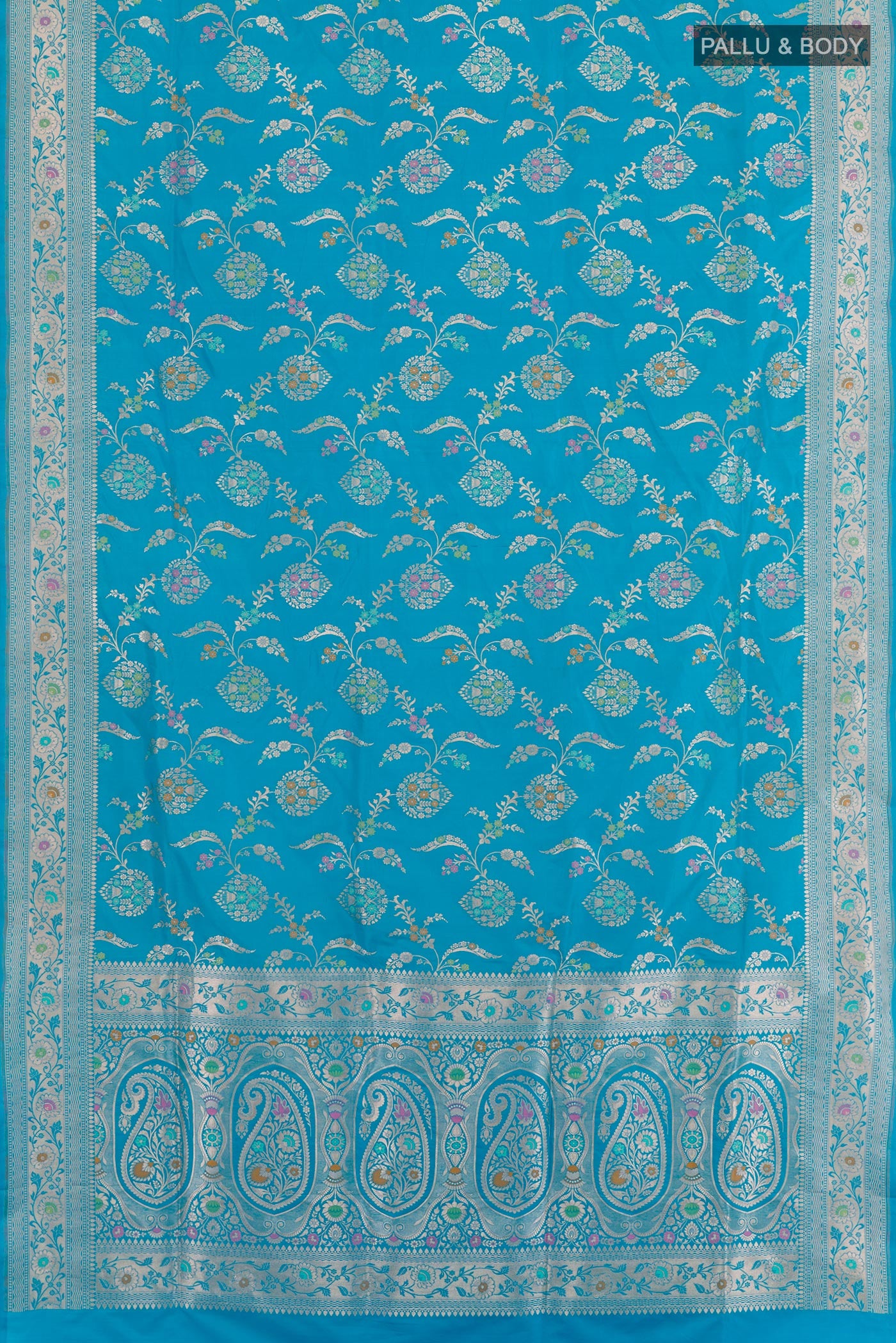 Flat view of Blue Banarasi Silk Saree with Zari Brocade on the body and Zari Border. 