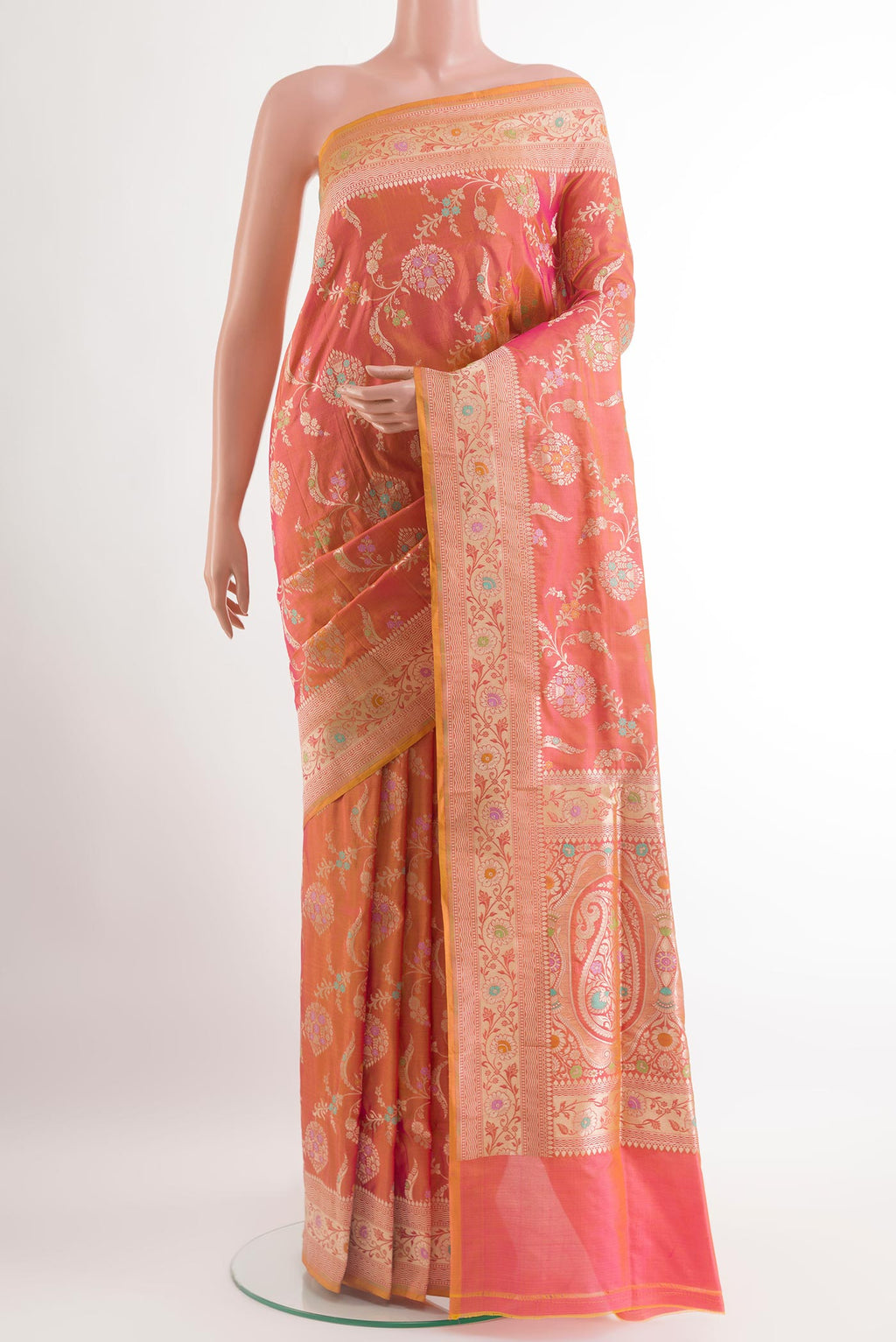 Peach Banarasi Silk Saree with Zari Brocade on the body and Zari Border.  displayed on a mannequin
