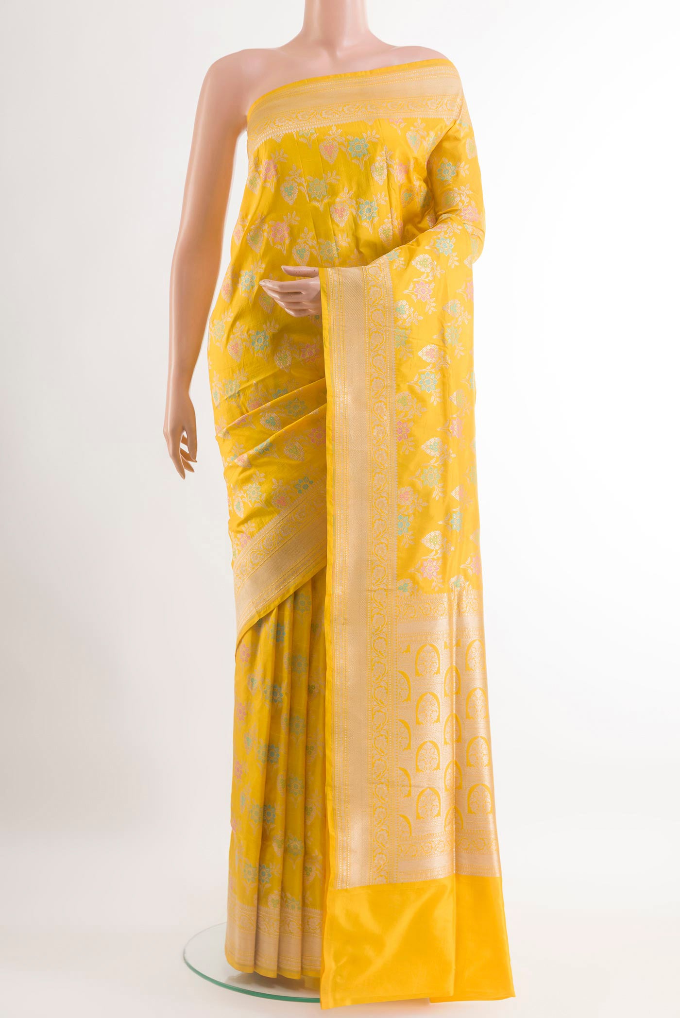 Yellow Banarasi Silk Saree with Zari Brocade on the body and Zari Border.  displayed on a mannequin