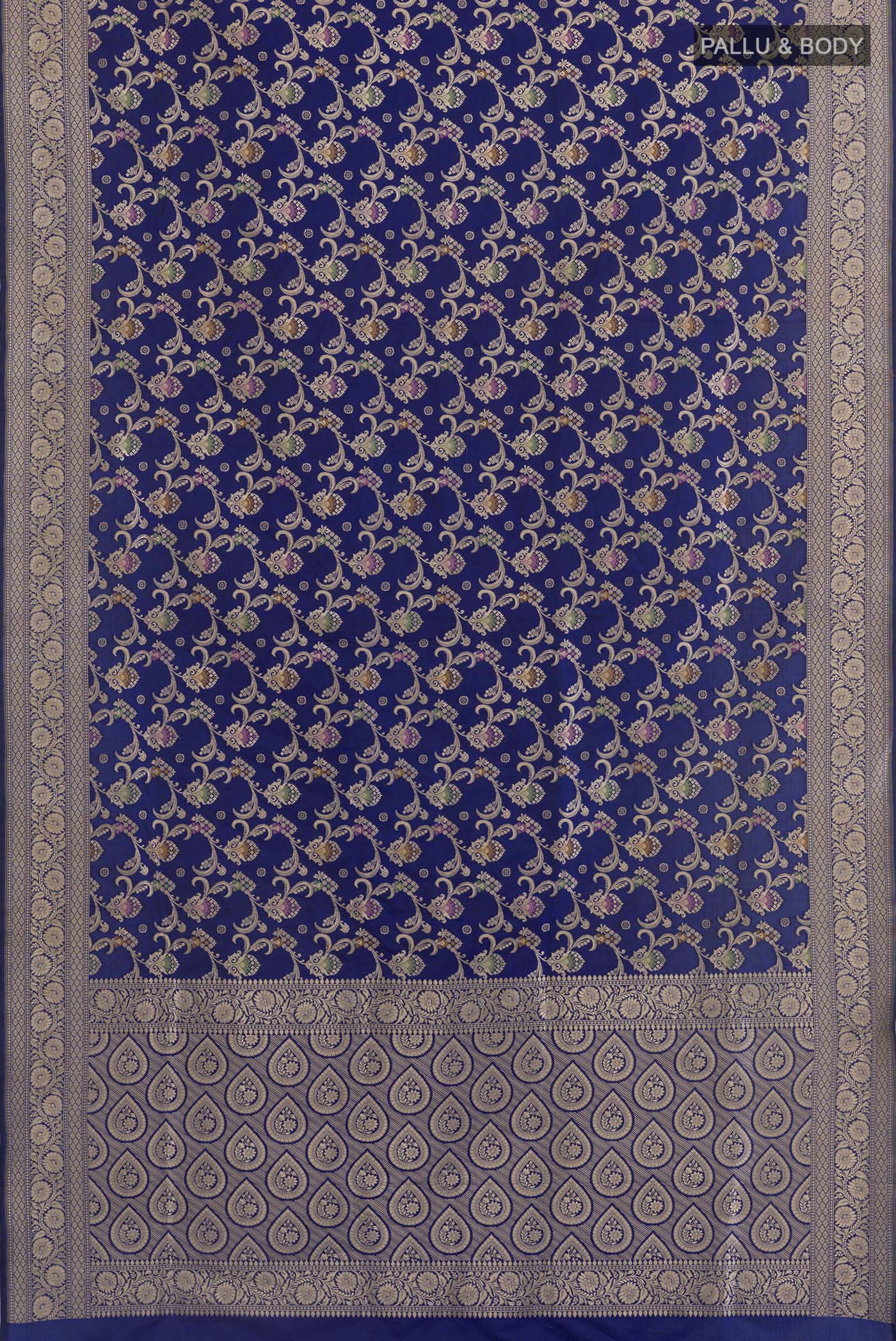 Flat view of Blue Banarasi Silk Saree with Zari Brocade on the body and Zari Border. 