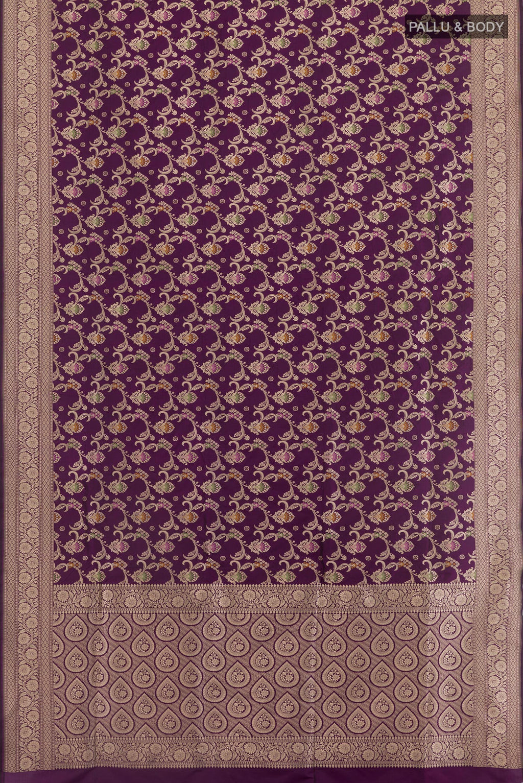Flat view of Purple Banarasi Silk Saree with Zari Brocade on the body and Zari Border. 