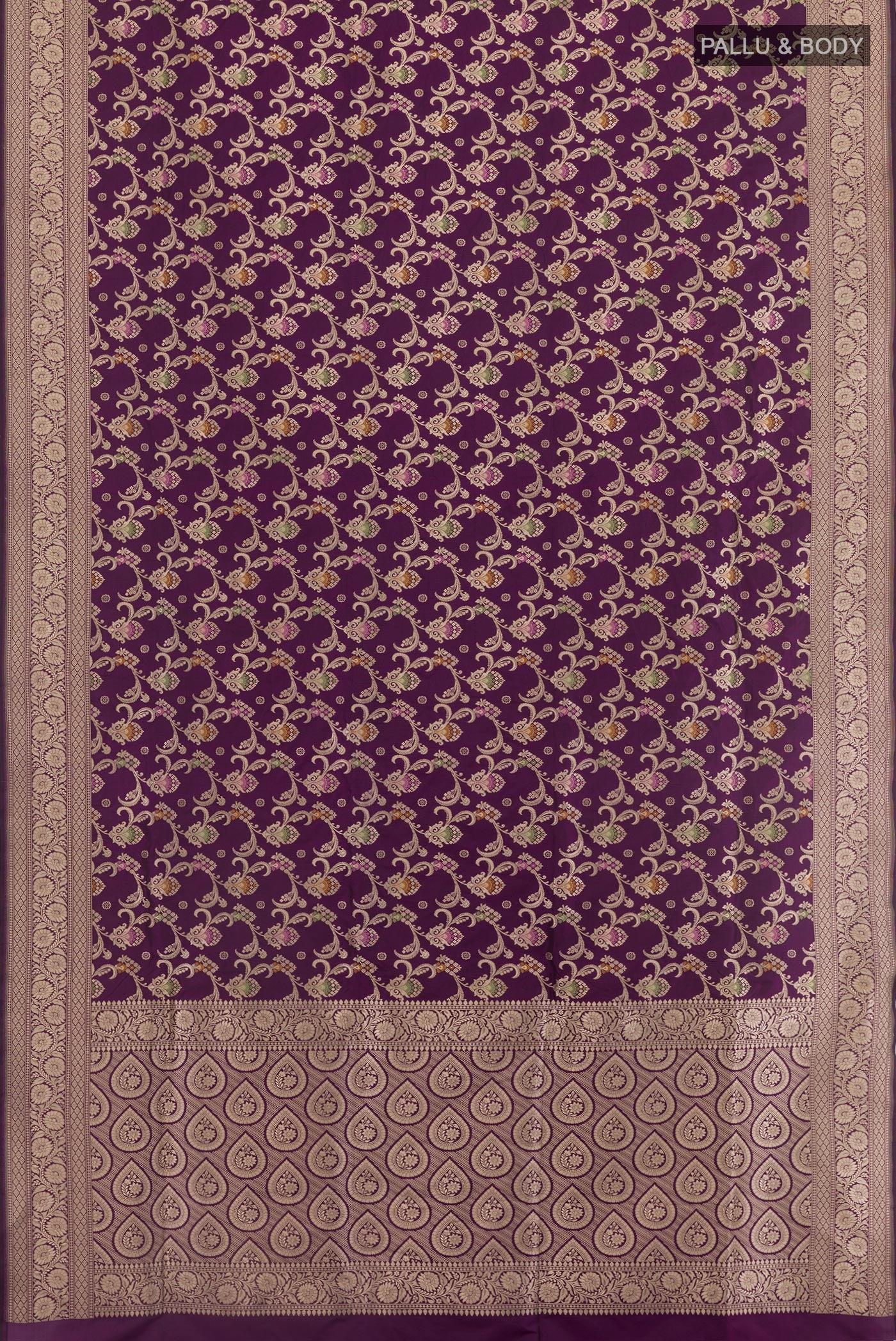 Flat view of Purple Banarasi Silk Saree with Zari Brocade on the body and Zari Border. 
