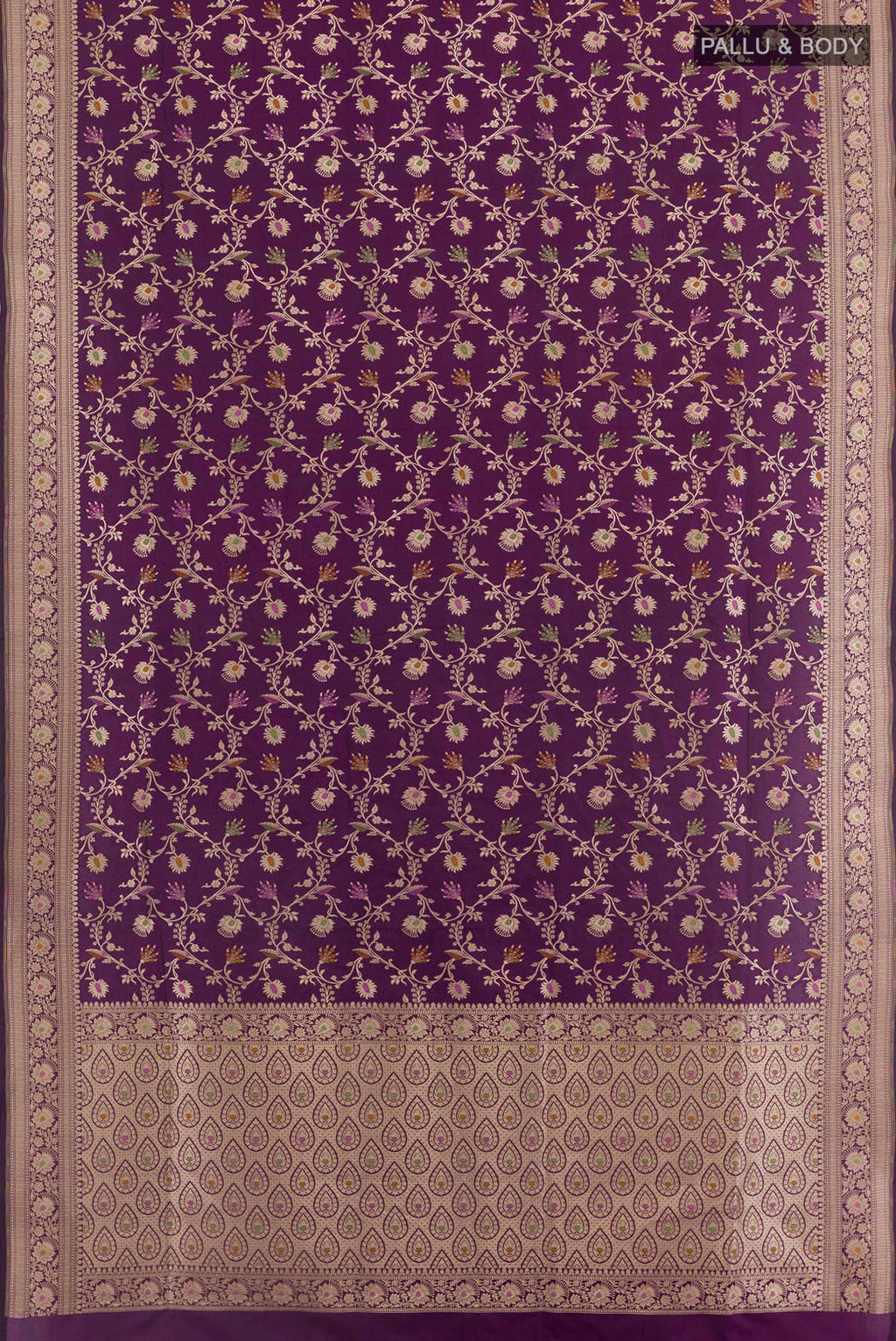 Flat view of Purple Banarasi Silk Saree with Zari Brocade on the body and Zari Border. 