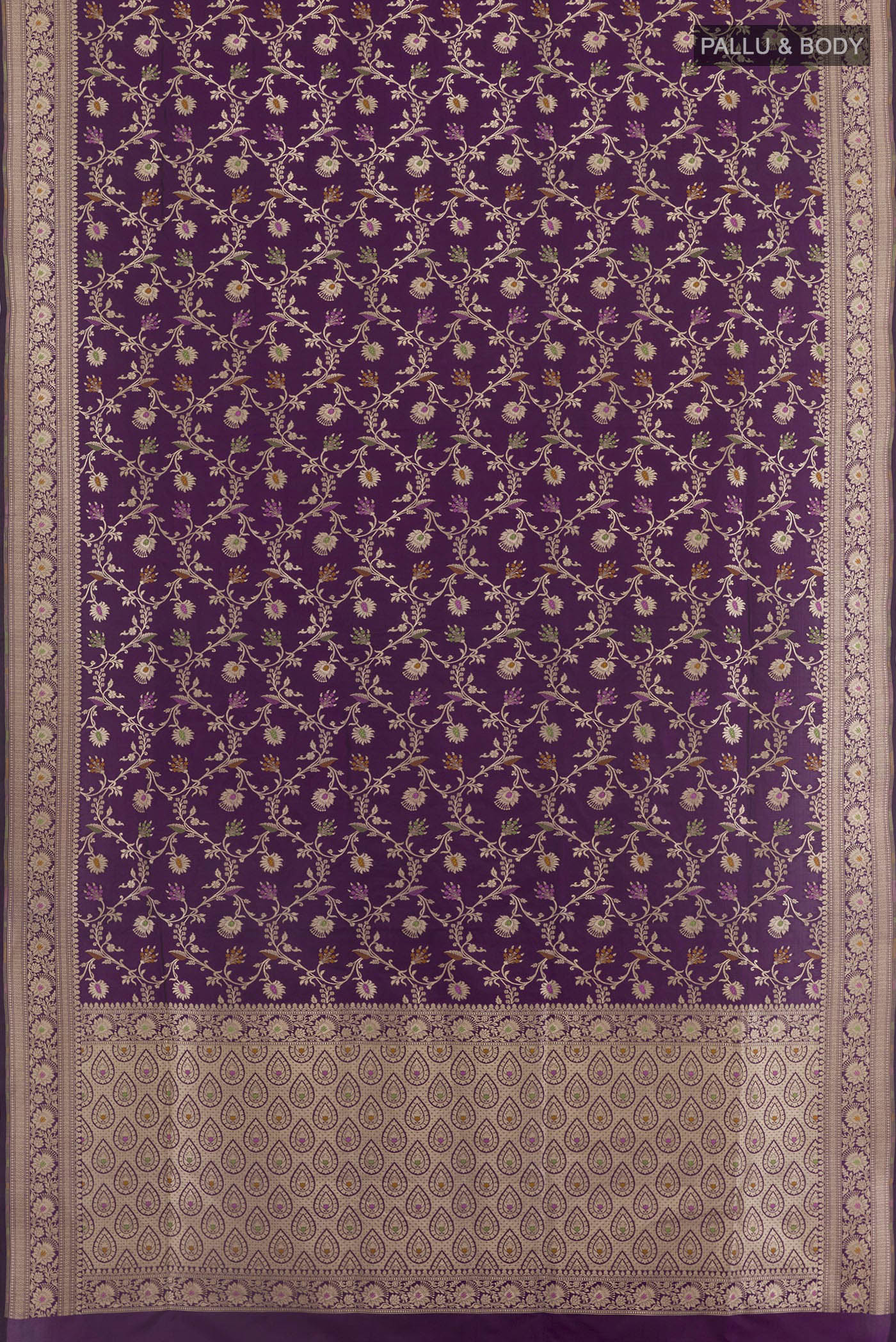 Flat view of Purple Banarasi Silk Saree with Zari Brocade on the body and Zari Border. 