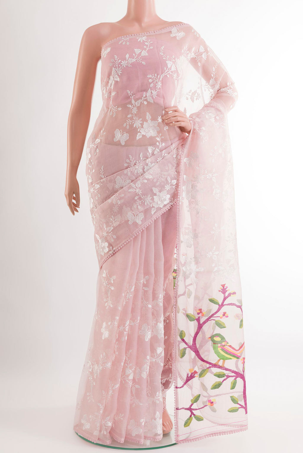 Pink Organza Silk Saree with Embroidery on the body and Embroidery Border.  displayed on a mannequin