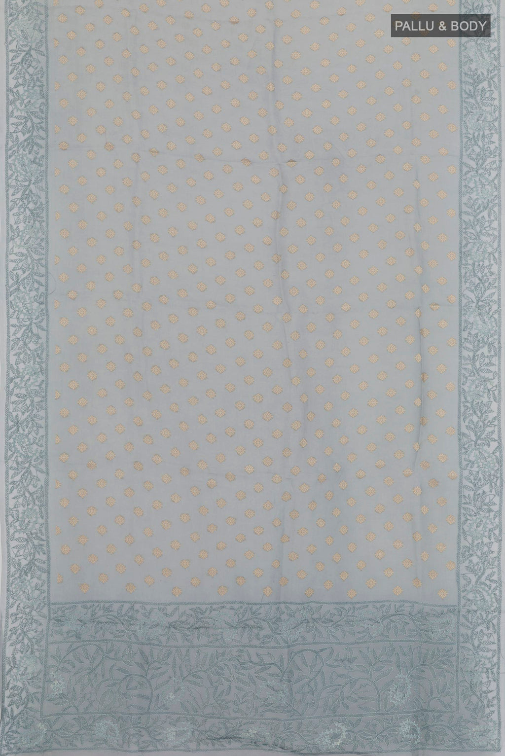 Flat view of Grey Organza Silk Saree with Zari Butta on the body and Embroidery Border. 