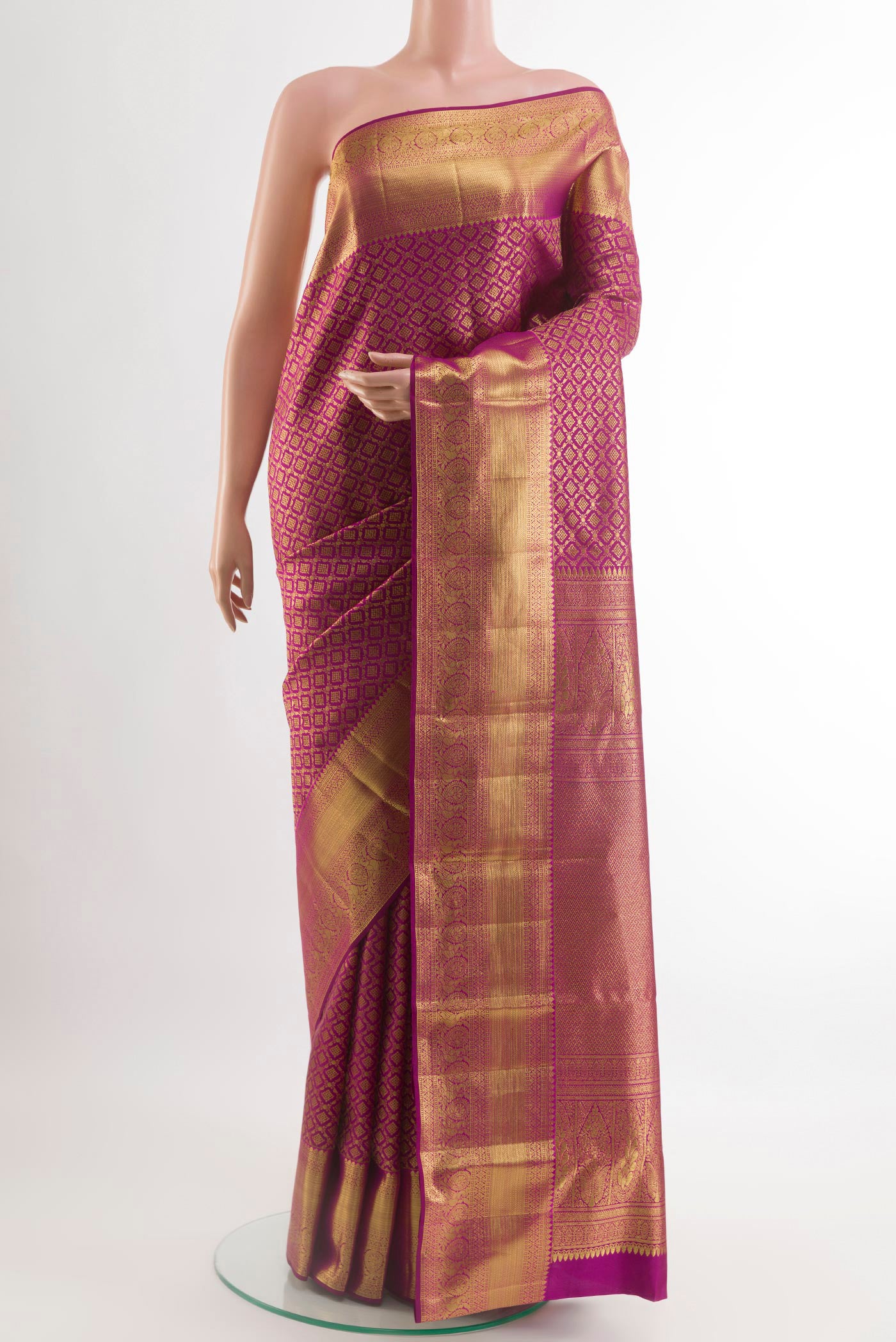 Purple Kanchipuram Silk Saree with Zari Brocade on the body and Zari Border.  displayed on a mannequin