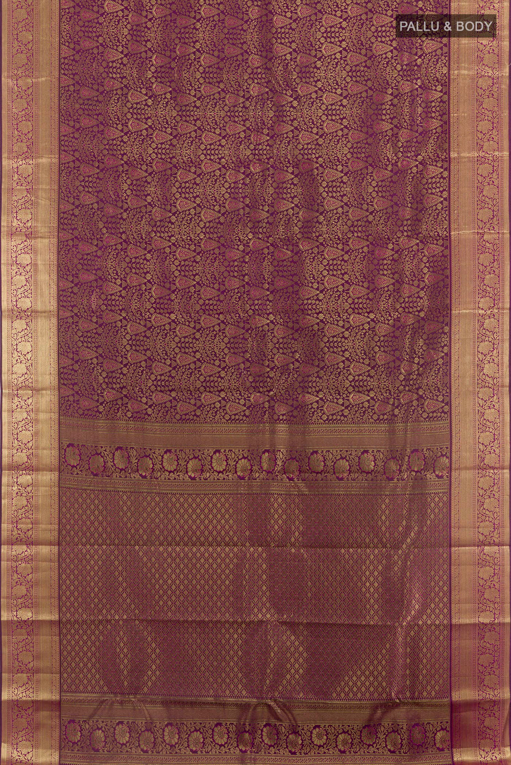 Flat view of Purple Kanchipuram Silk Saree with Zari Brocade on the body and Zari Border. 