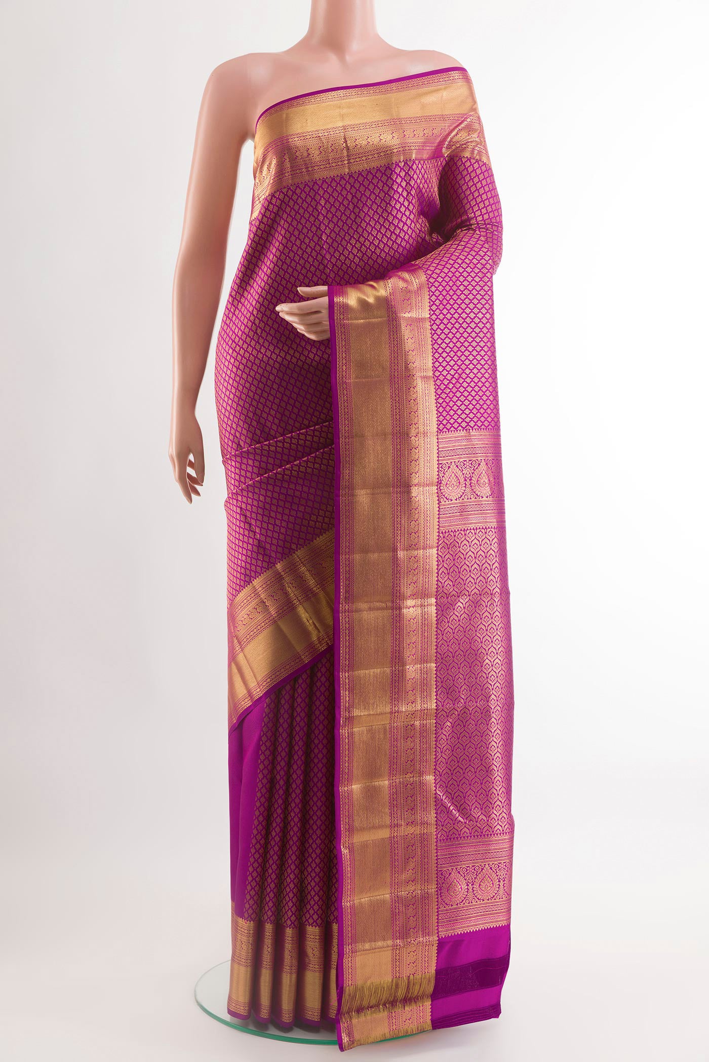 Purple Kanchipuram Silk Saree with Zari Brocade on the body and Zari Border.  displayed on a mannequin