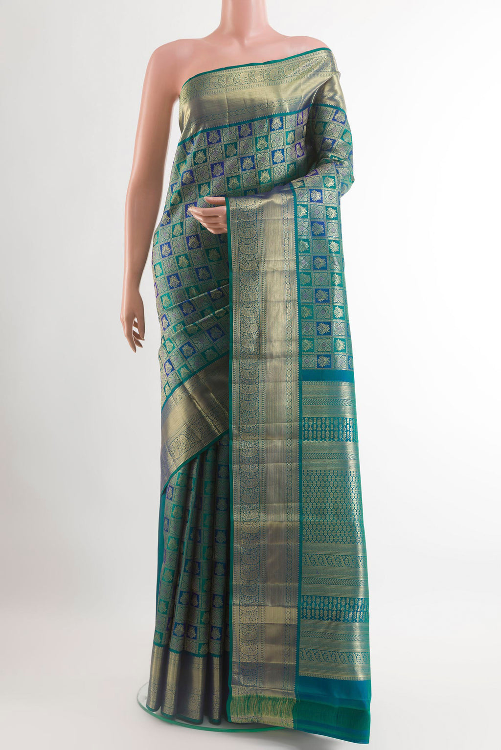 Sea Green Kanchipuram Silk Saree with Zari Brocade on the body and Zari Border.  displayed on a mannequin