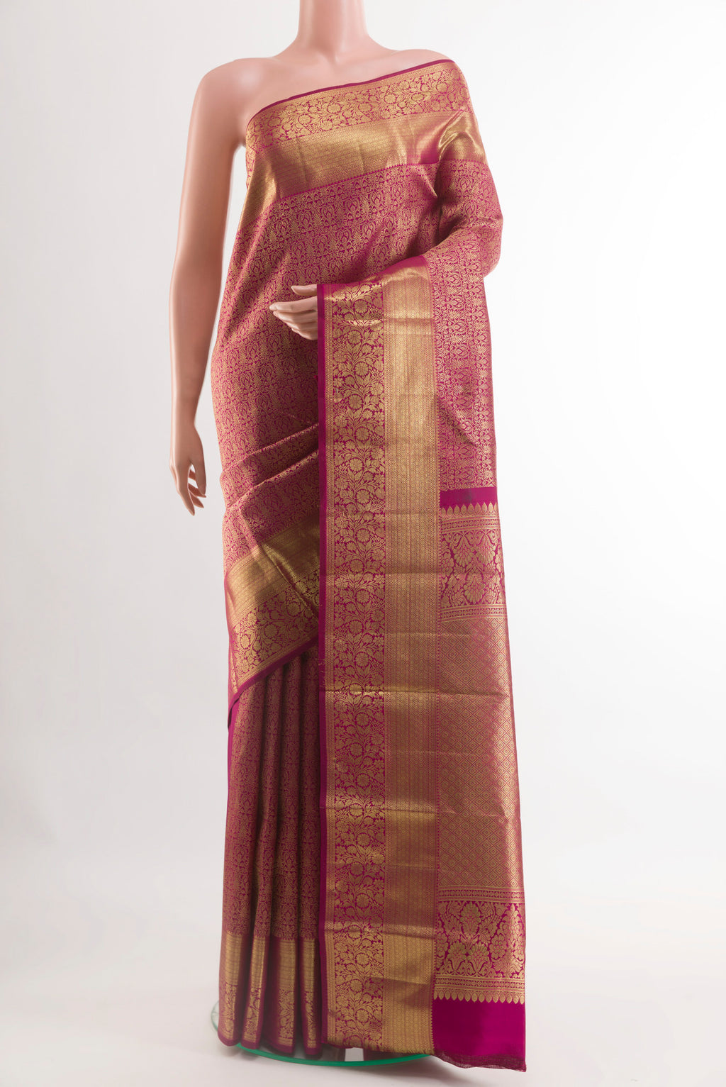 Purple Kanchipuram Silk Saree with Zari Brocade on the body and Zari Border.  displayed on a mannequin